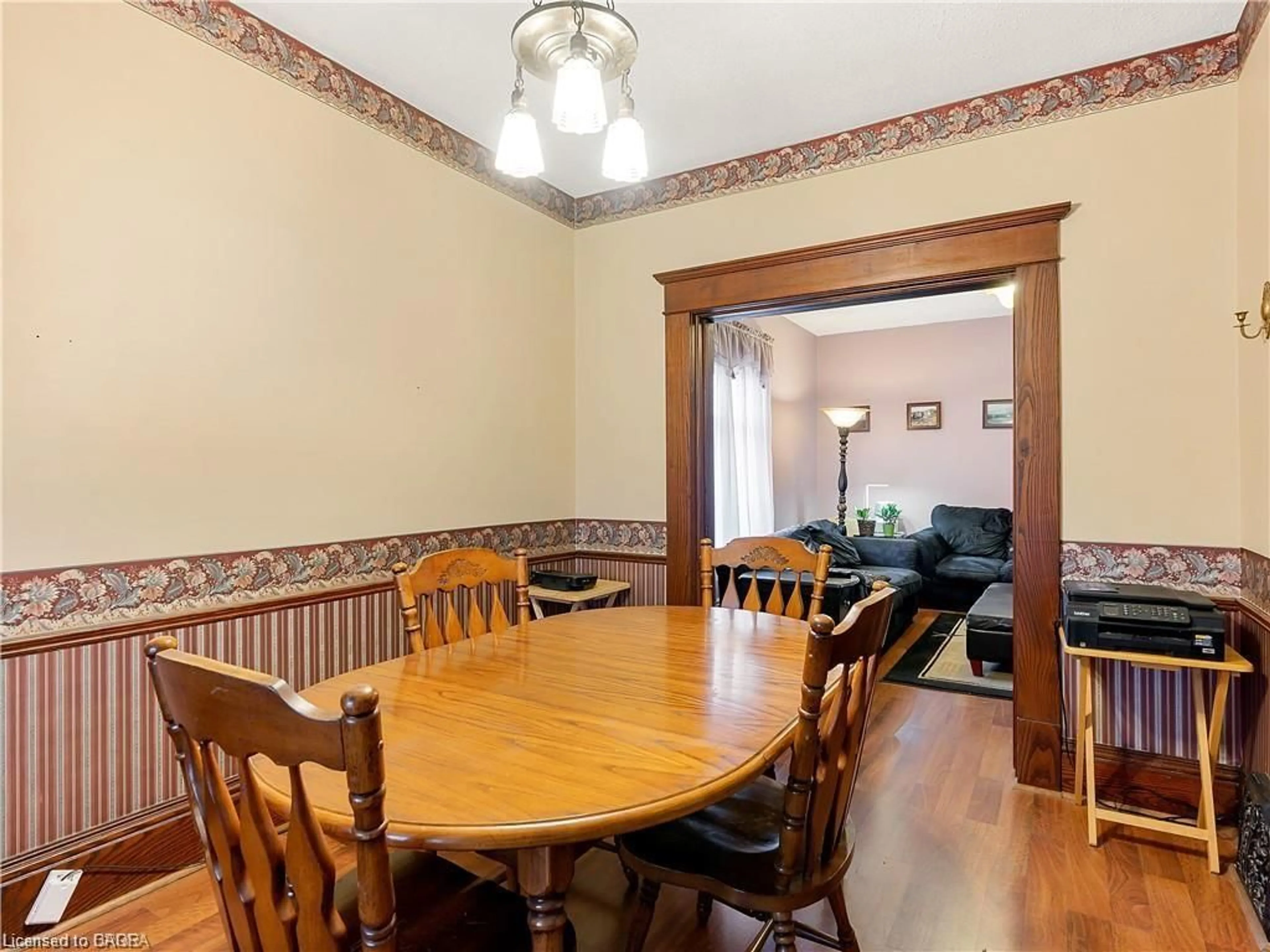 Dining room, wood/laminate floor for 49 Mintern Ave, Brantford Ontario N3S 1K9