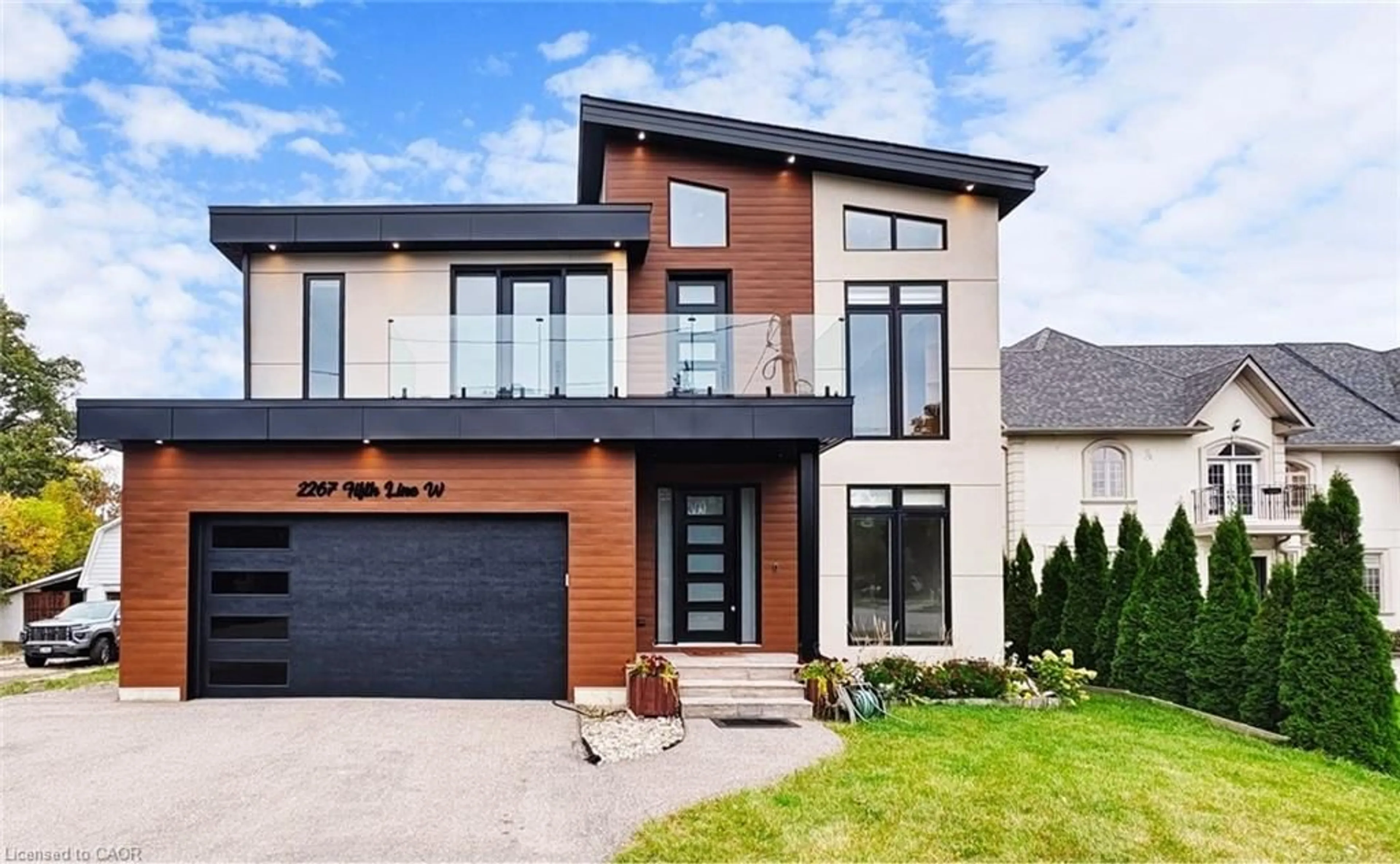 Home with brick exterior material, street for 2267 Fifth Line, Mississauga Ontario L5K 1V7