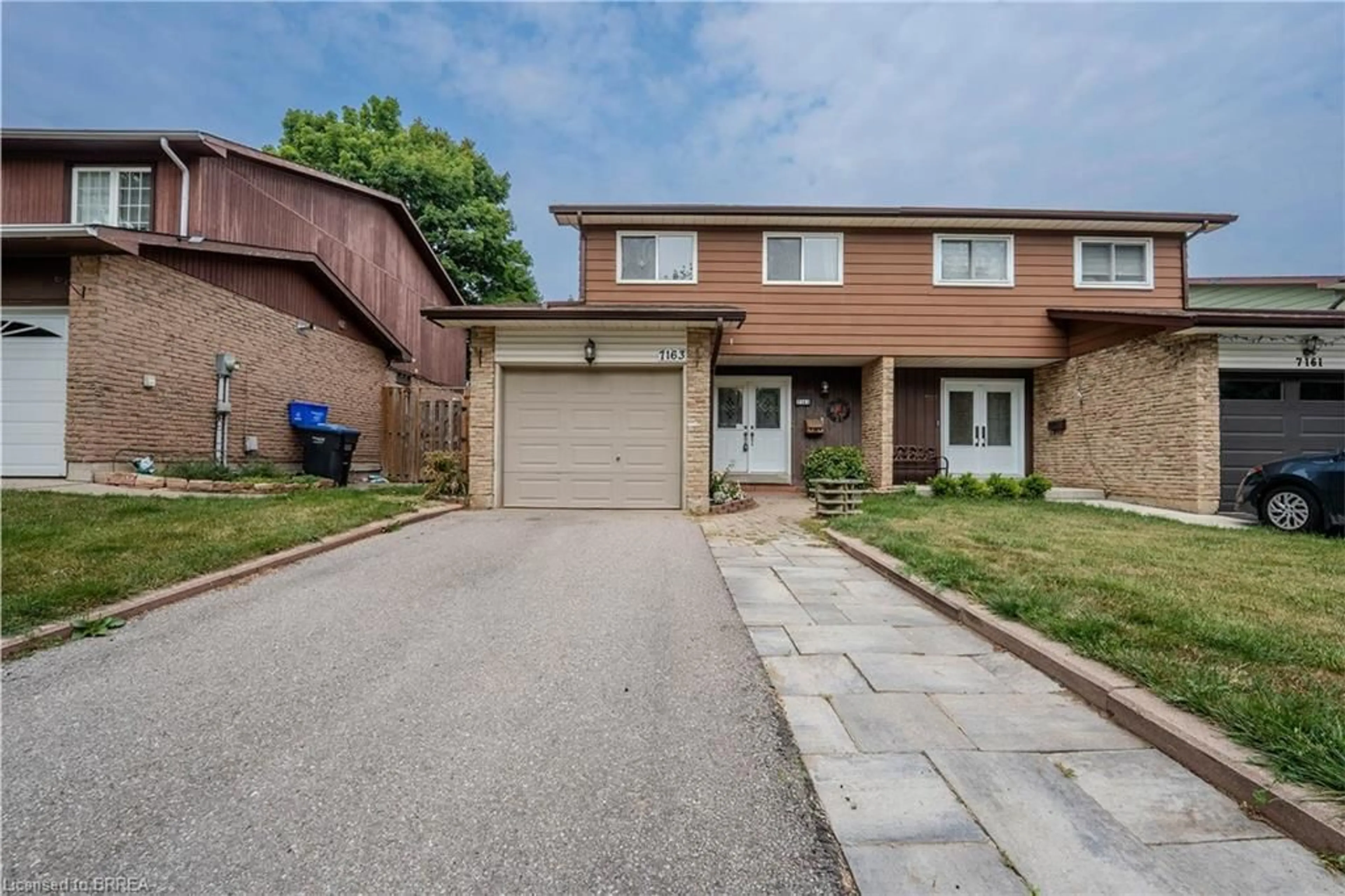 Home with brick exterior material, street for 7163 Fayette Cir, Mississauga Ontario L5N 1Y5