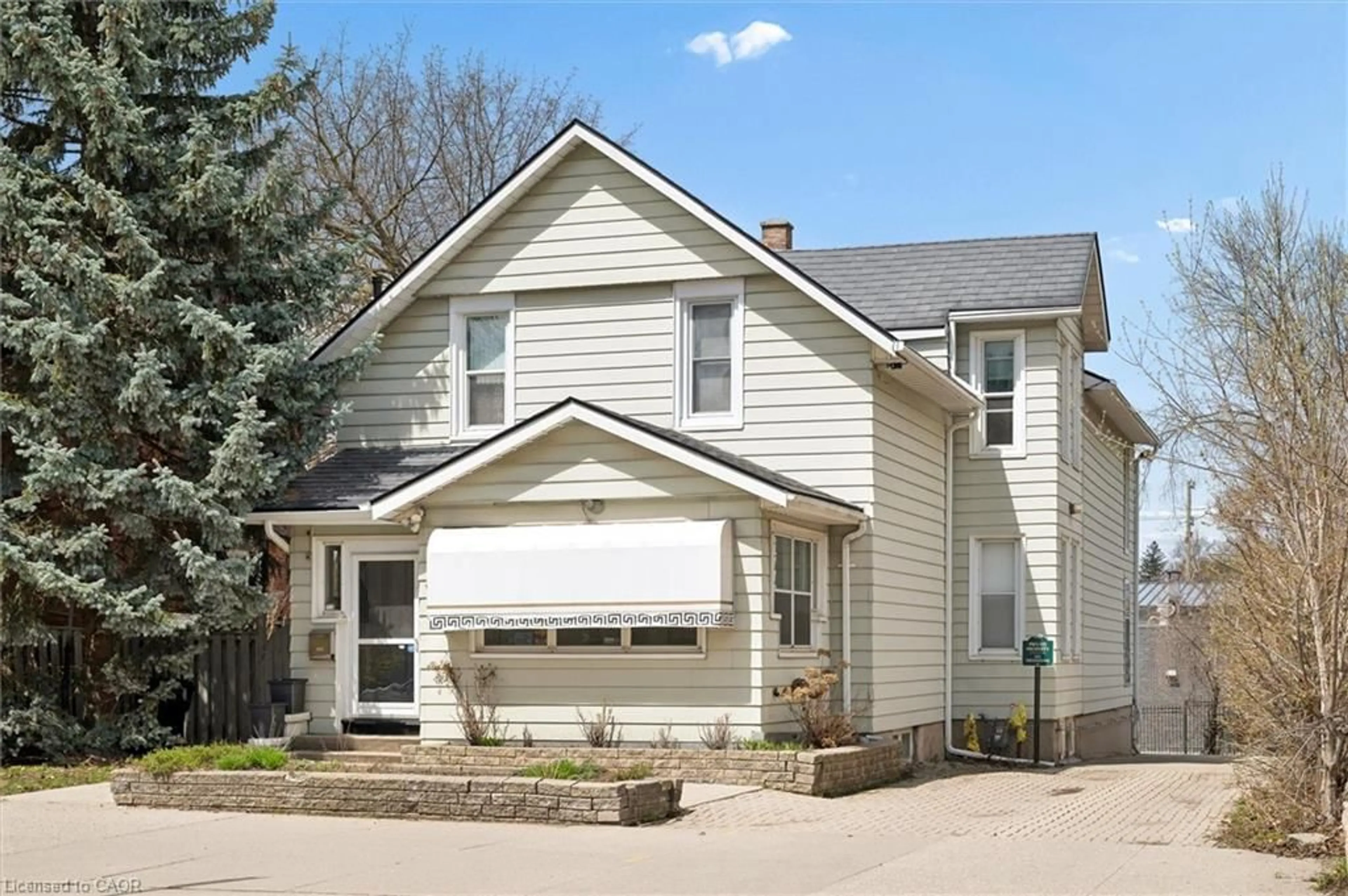 Home with vinyl exterior material, street for 64 Francis St, Kitchener Ontario N2H 5B5