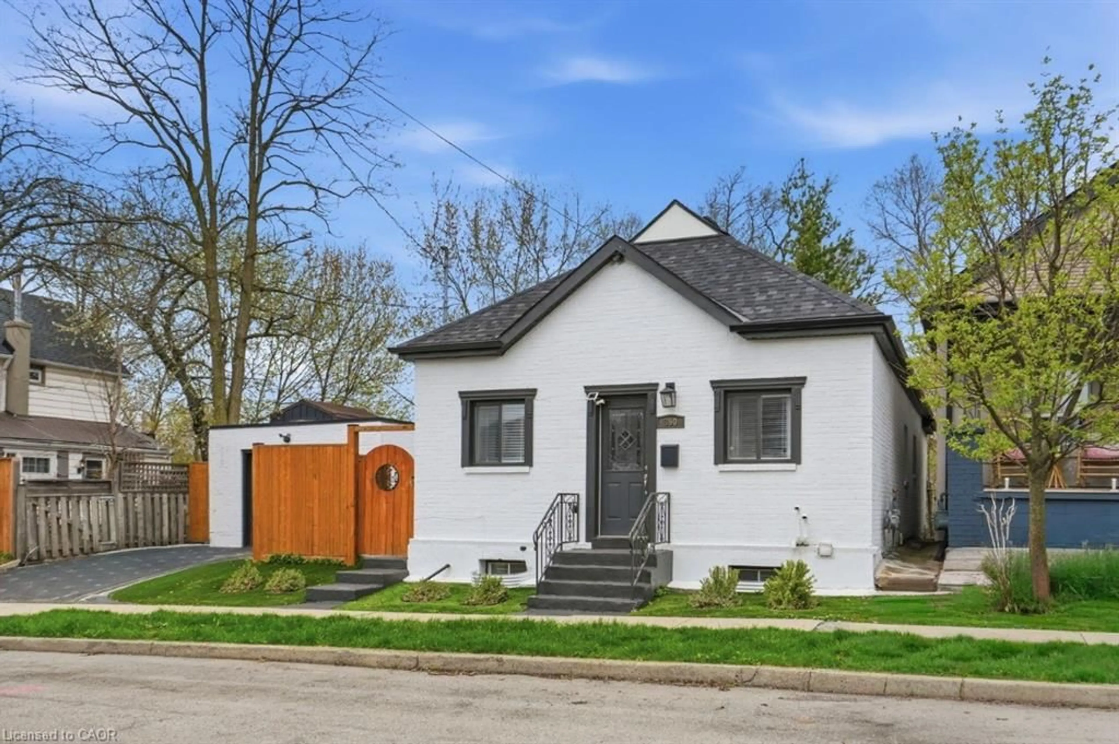 Home with brick exterior material, street for 390 Hunter St, Hamilton Ontario L8P 1S9