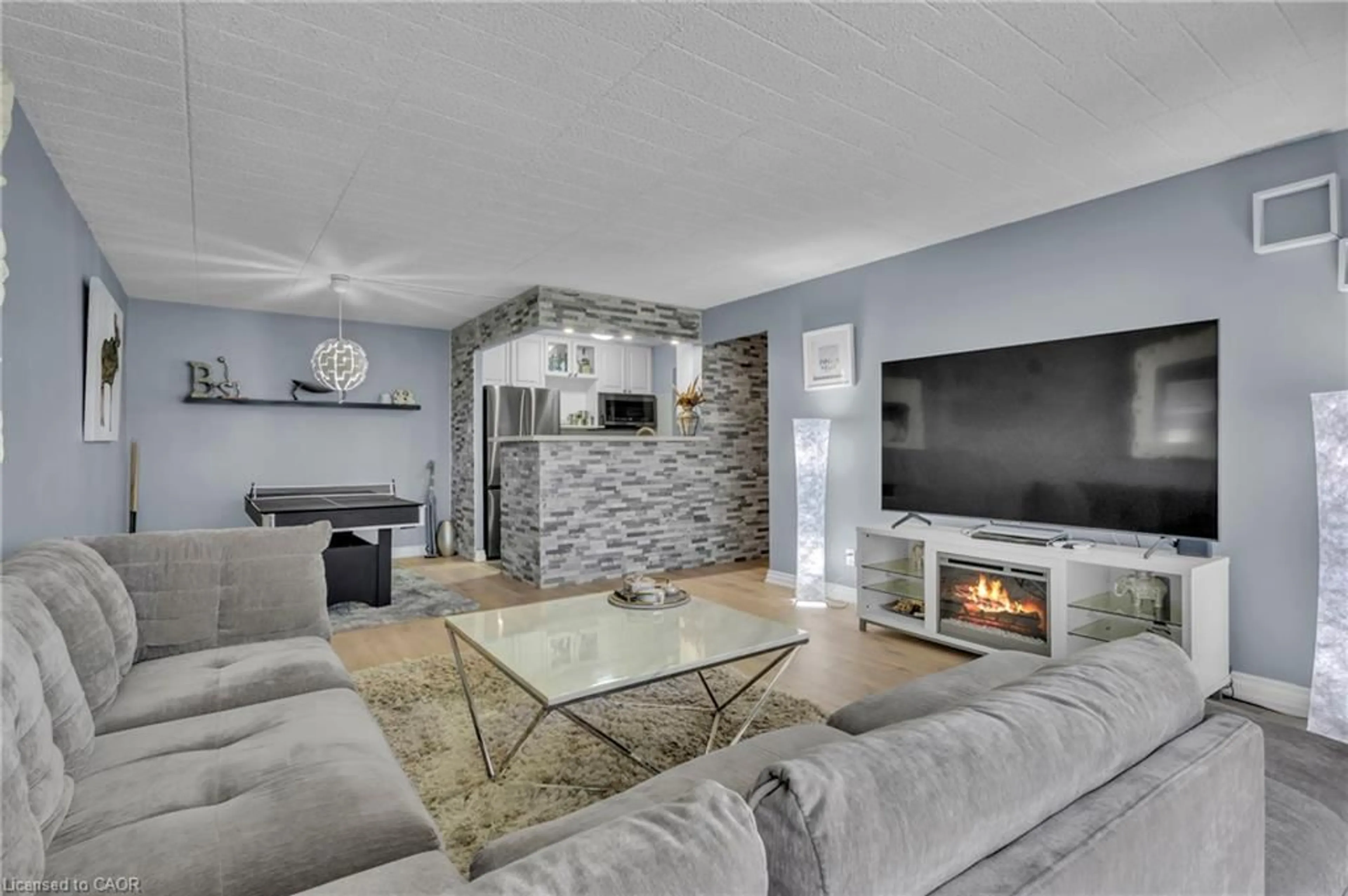 Living room with furniture, unknown for 80 Breckenridge Dr #107, Kitchener Ontario N2B 2N9