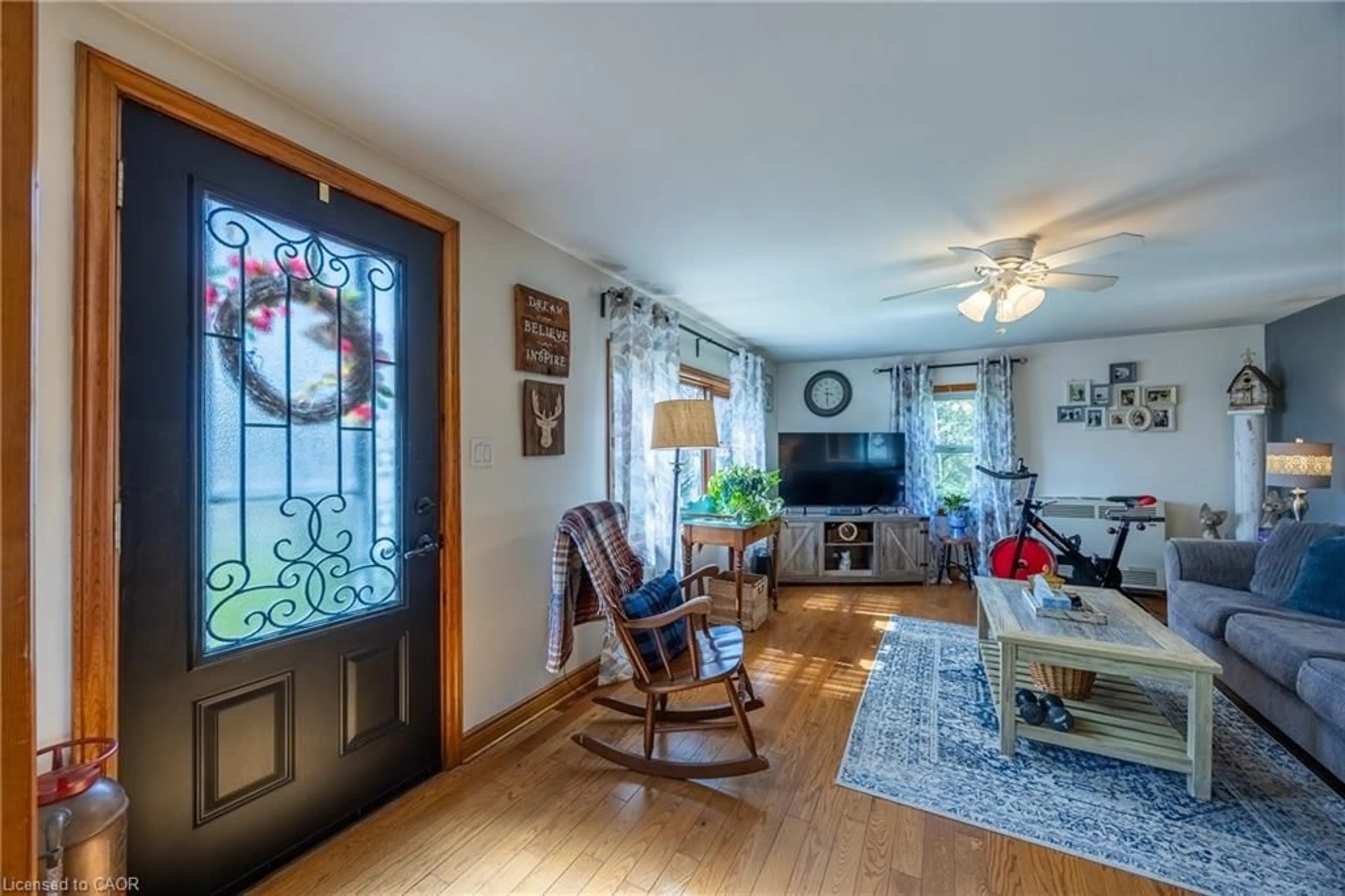 Living room with furniture, wood/laminate floor for 282 Townline St, St. Williams Ontario N0E 1P0