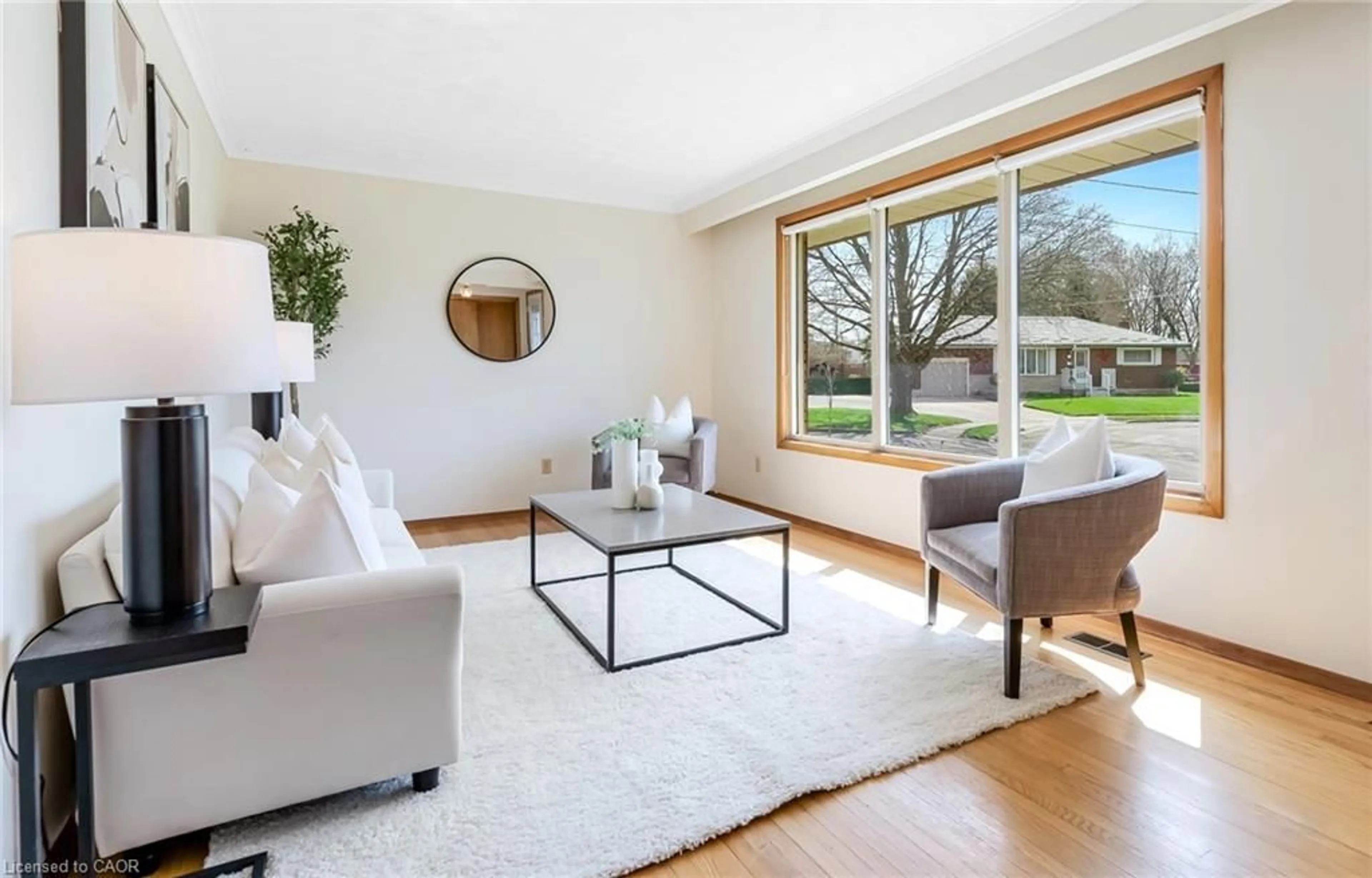 Living room with furniture, wood/laminate floor for 10 Westoby Pl, Guelph Ontario N1E 2B3