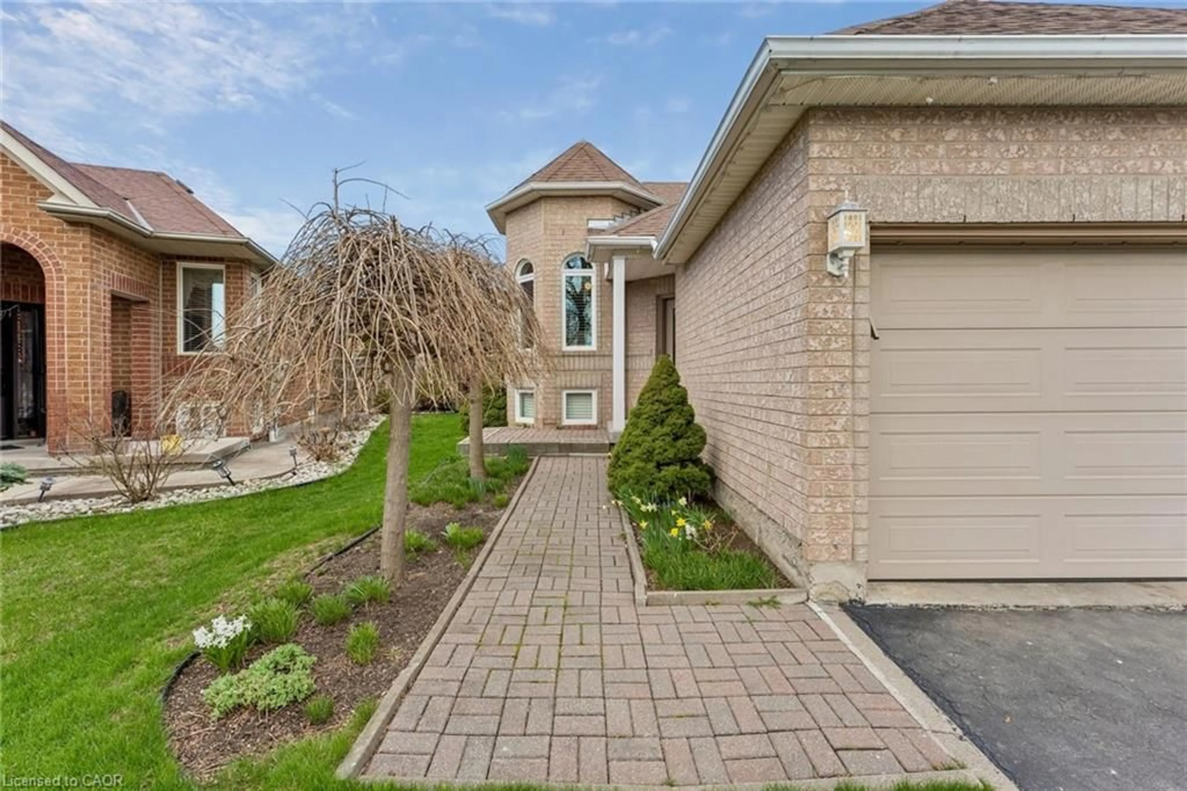 Home with brick exterior material, street for 80 Pebblestone Cir, Brampton Ontario L6X 4M8