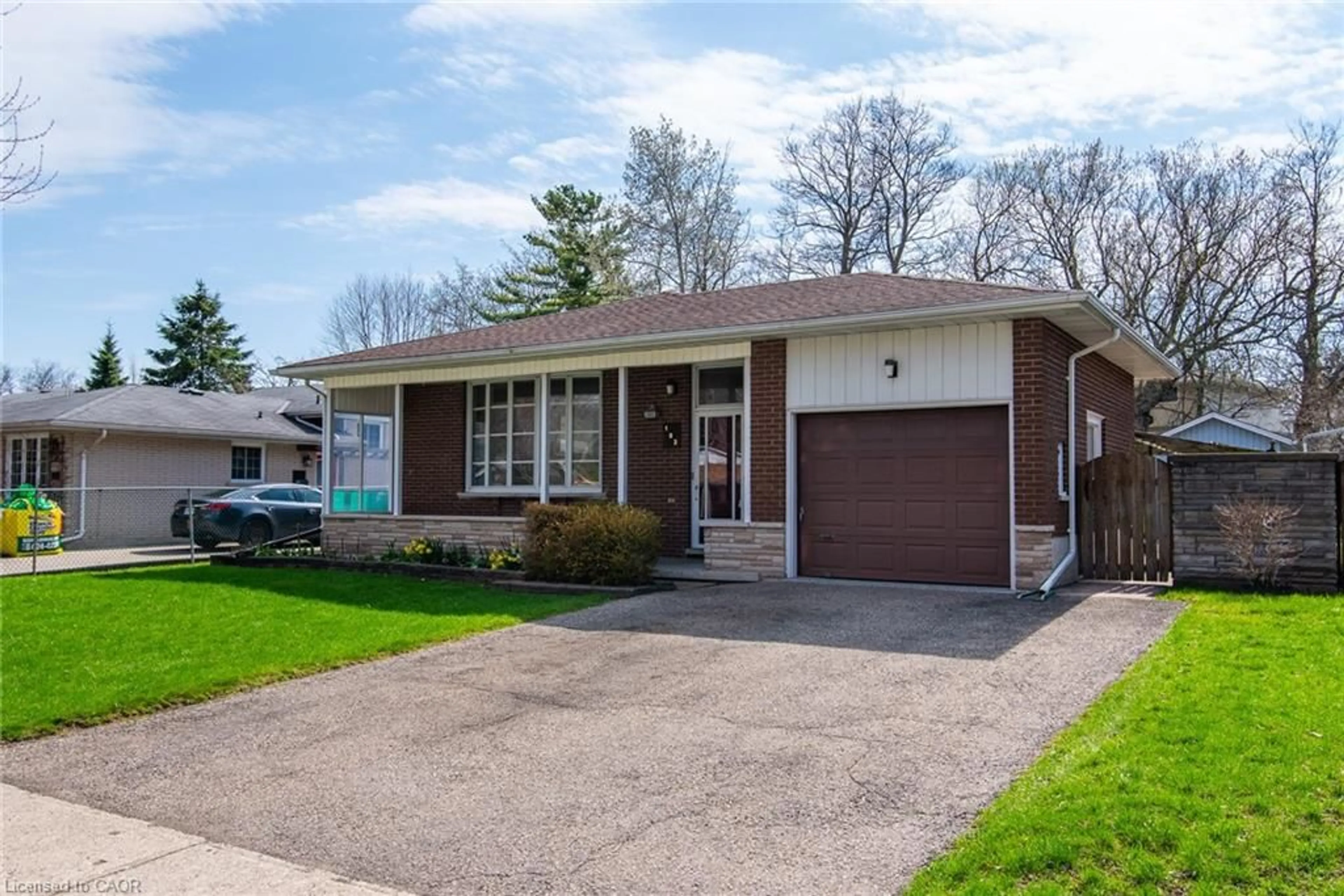 Home with brick exterior material, street for 103 Queenston Dr, Kitchener Ontario N2B 2V2