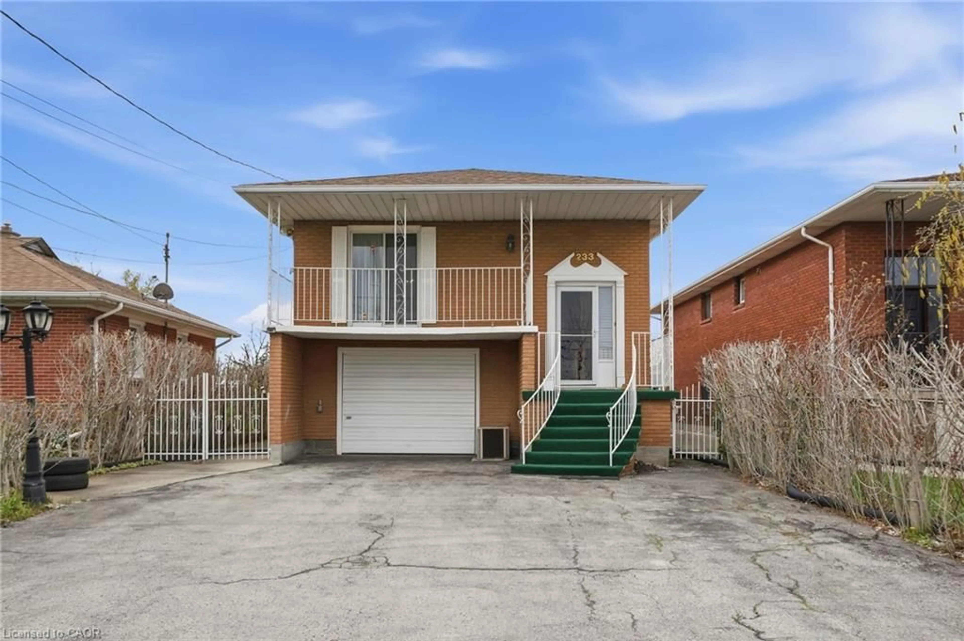 Home with brick exterior material, street for 233 Fruitland Rd, Stoney Creek Ontario L8E 5J8