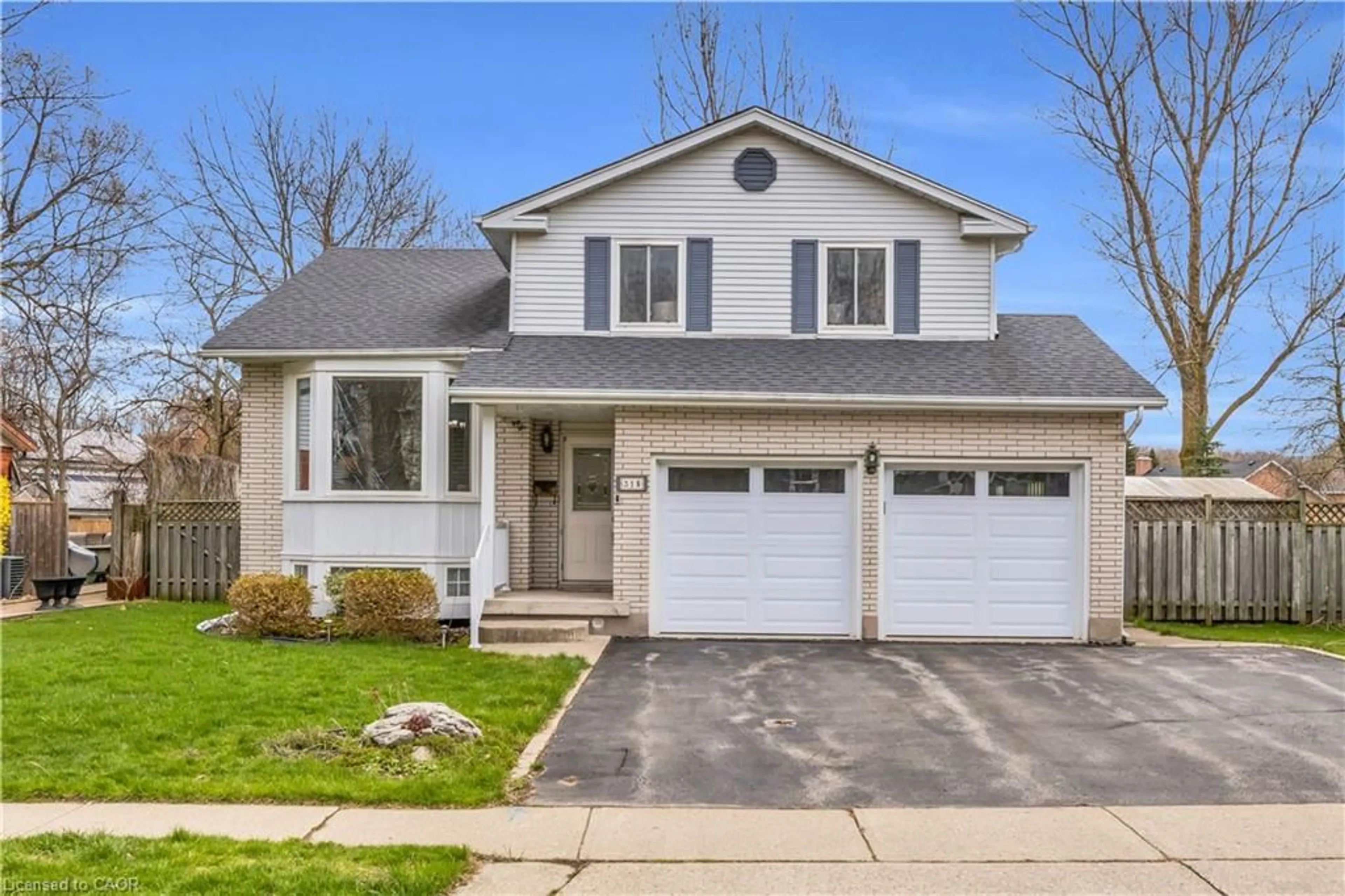 Home with vinyl exterior material, street for 318 Burnett Ave, Cambridge Ontario N1T 1G6