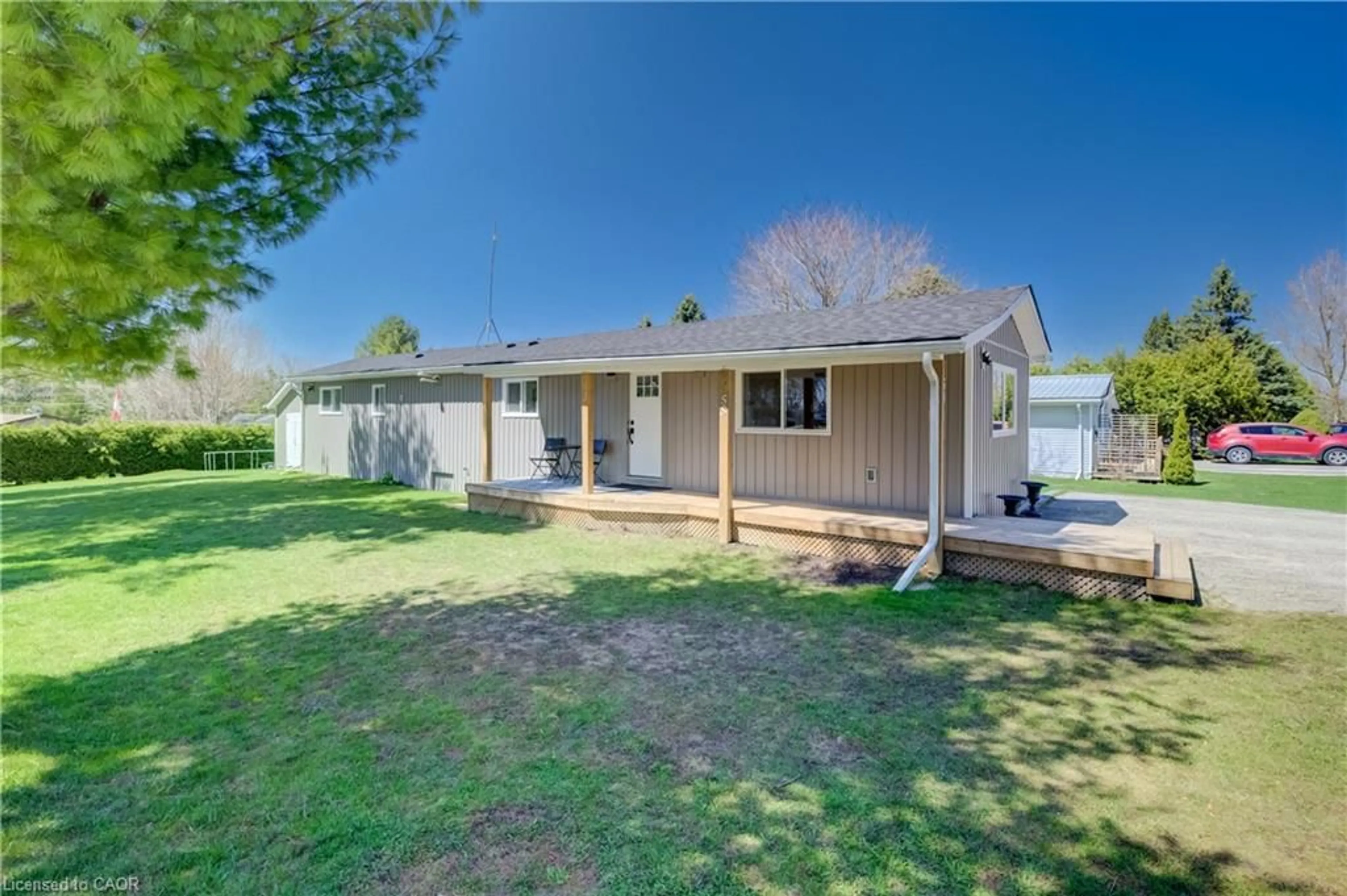 A pic from outside/outdoor area/front of a property/back of a property/a pic from drone, street for 8773 Concession Road 9 #58 2nd Ave, Wellington North Ontario N0G 2K0