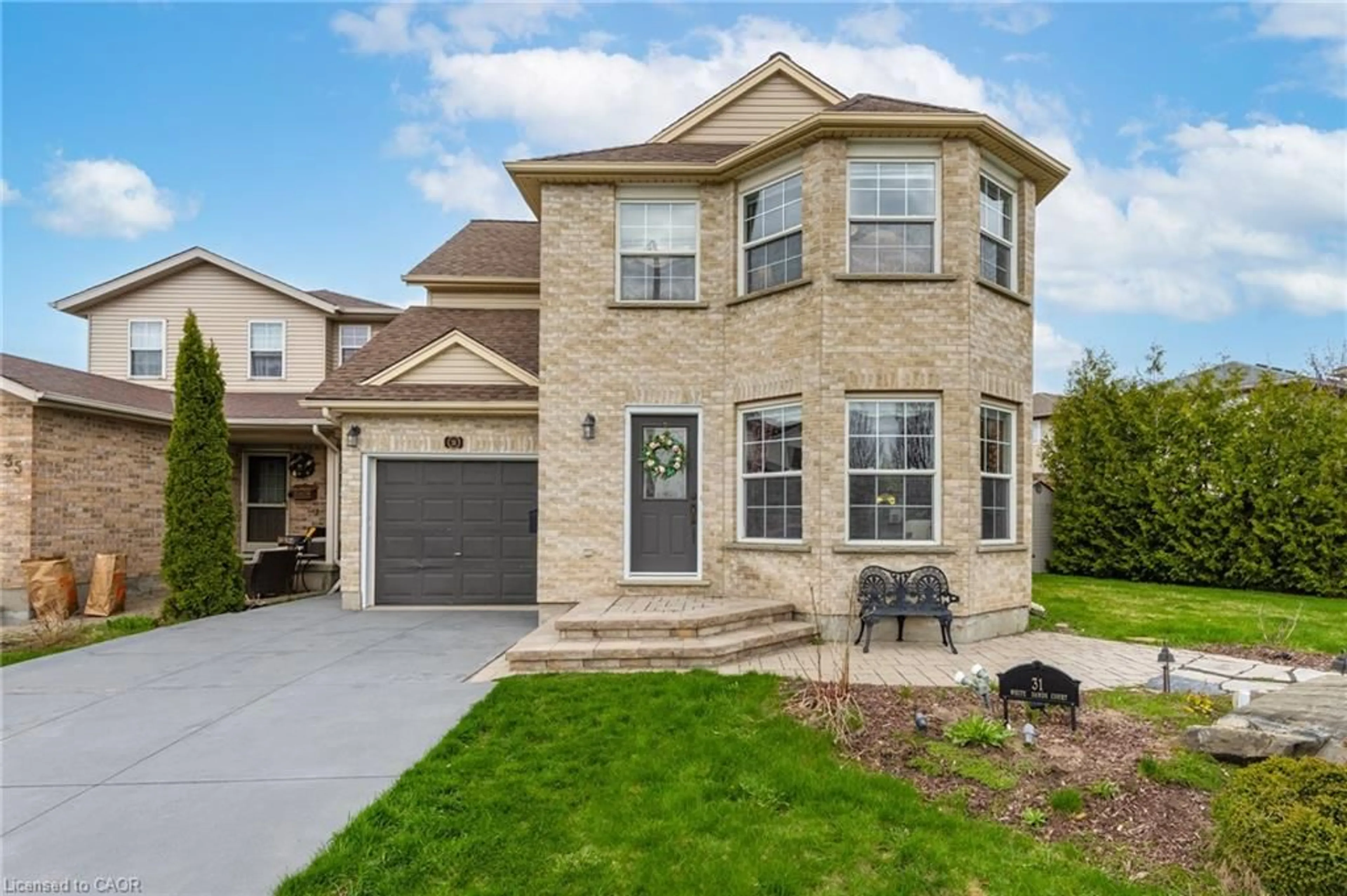 Home with brick exterior material, street for 31 White Sands Crt, Kitchener Ontario N2E 3S4