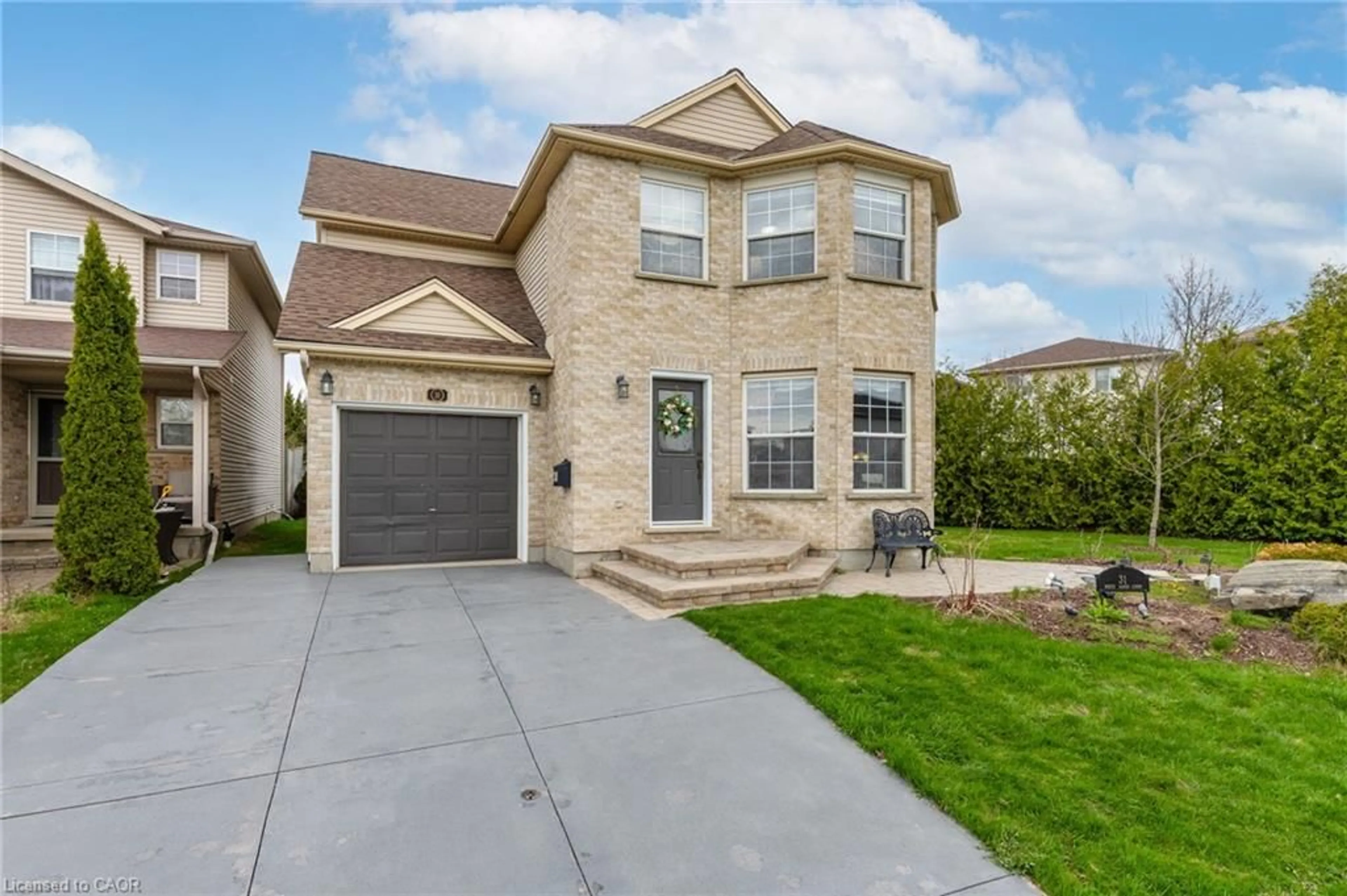 Home with brick exterior material, street for 31 White Sands Crt, Kitchener Ontario N2E 3S4
