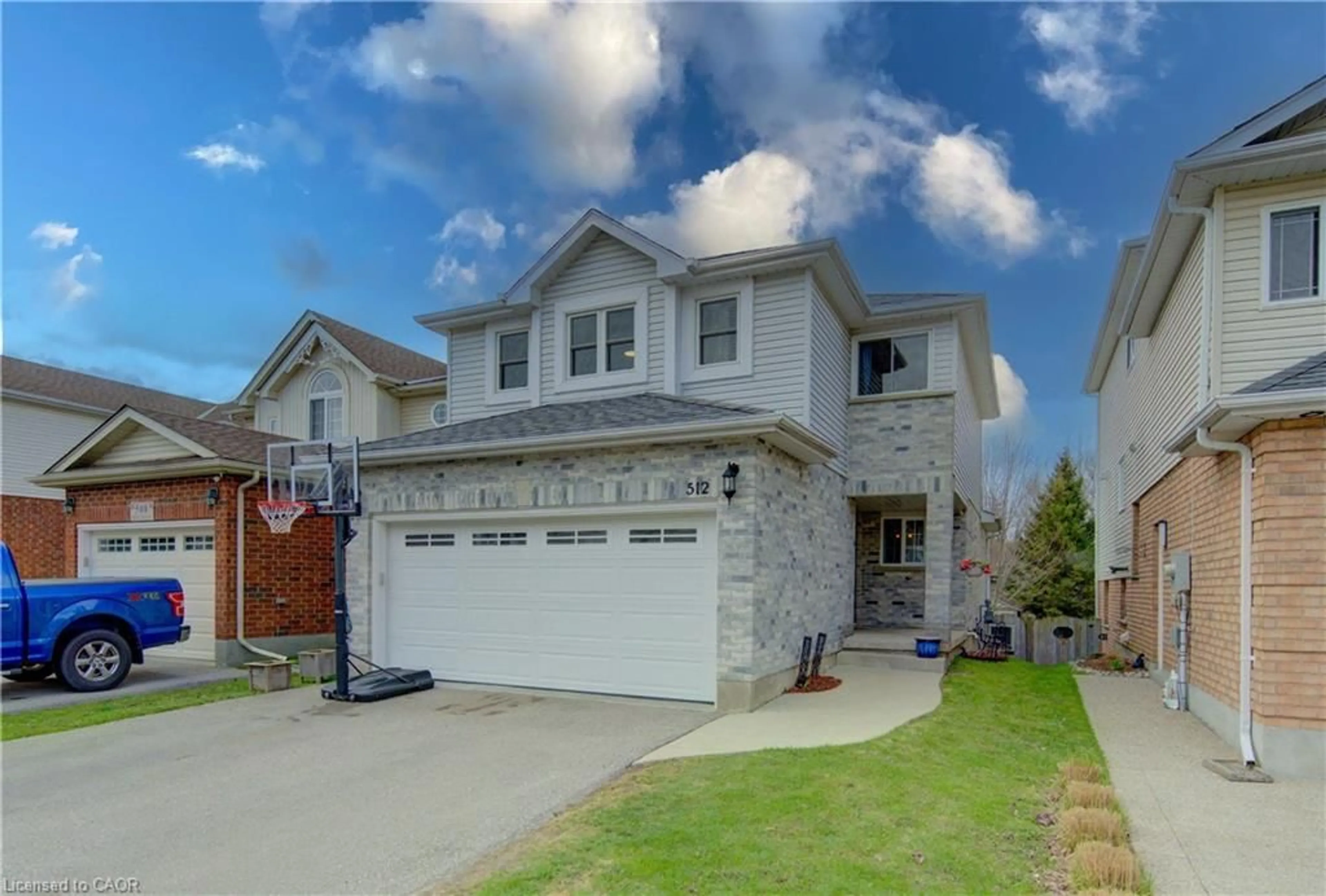 Home with brick exterior material, street for 512 Hidden Creek Dr, Kitchener Ontario N2N 3M1