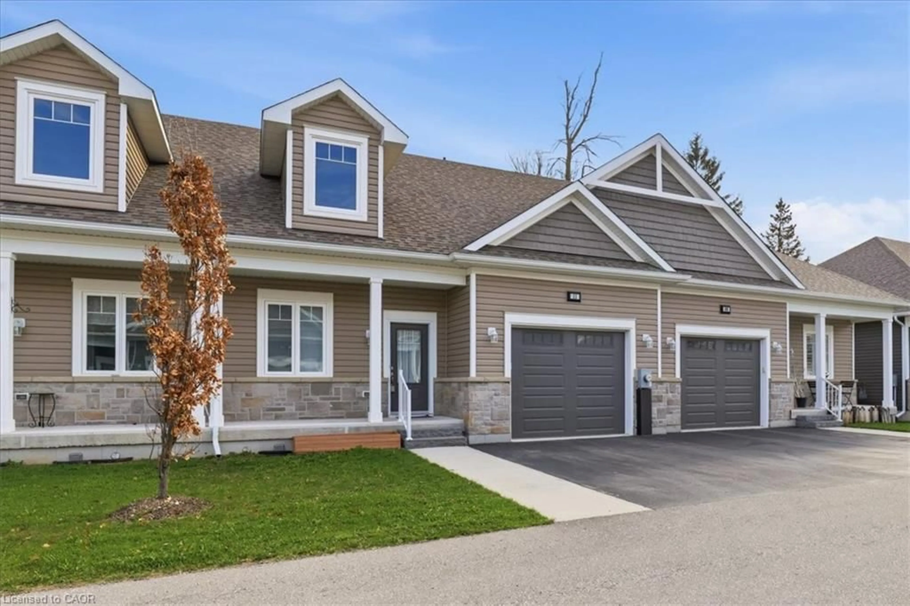 Home with brick exterior material, street for 24 George St #11, Harriston Ontario N0G 1Z0