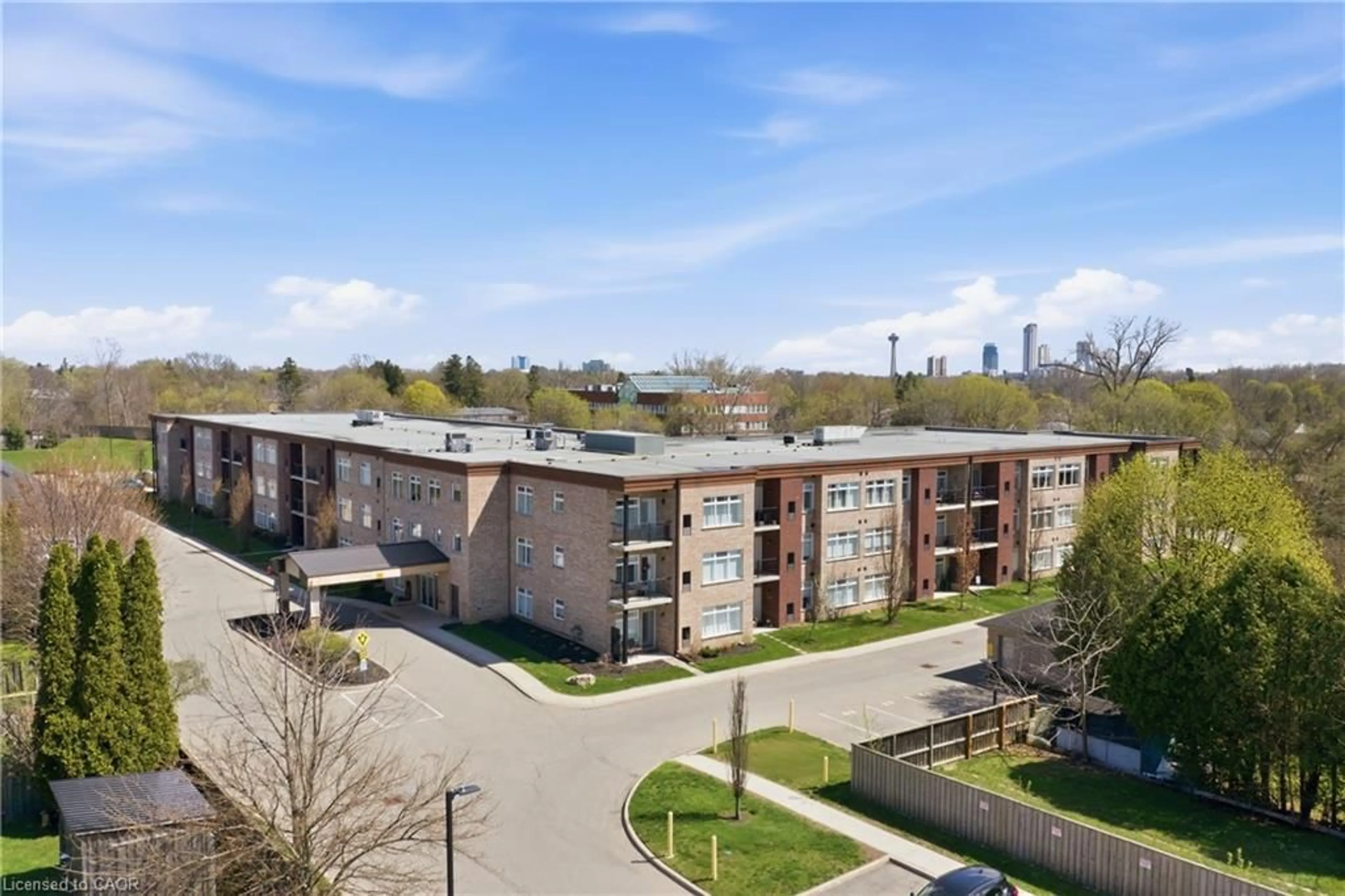 A pic from outside/outdoor area/front of a property/back of a property/a pic from drone, building for 4644 Pettit Ave #203, Niagara Falls Ontario L2E 6L5