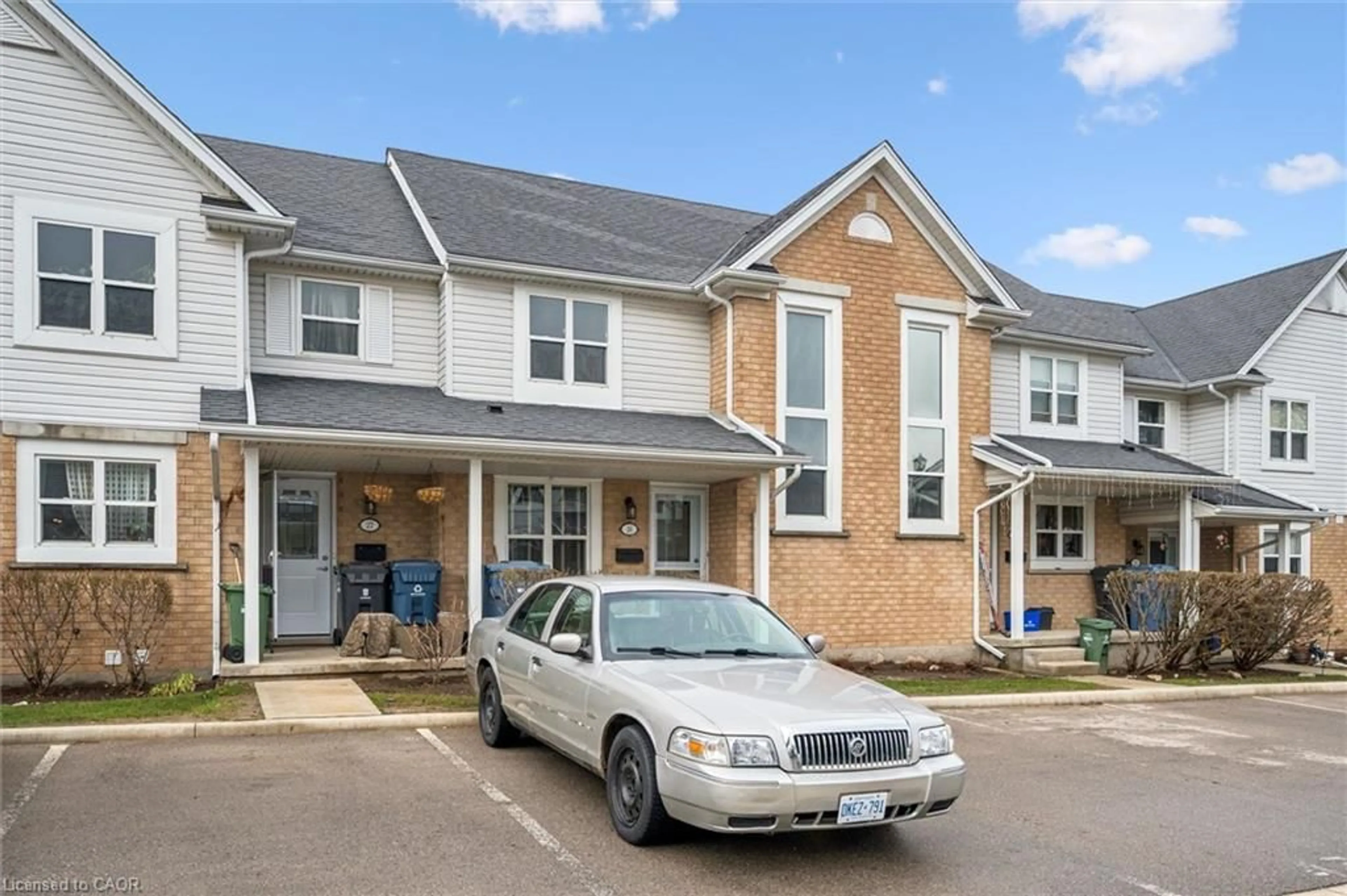 Home with vinyl exterior material, street for 426 Grange Rd #26, Guelph Ontario N1E 7E4