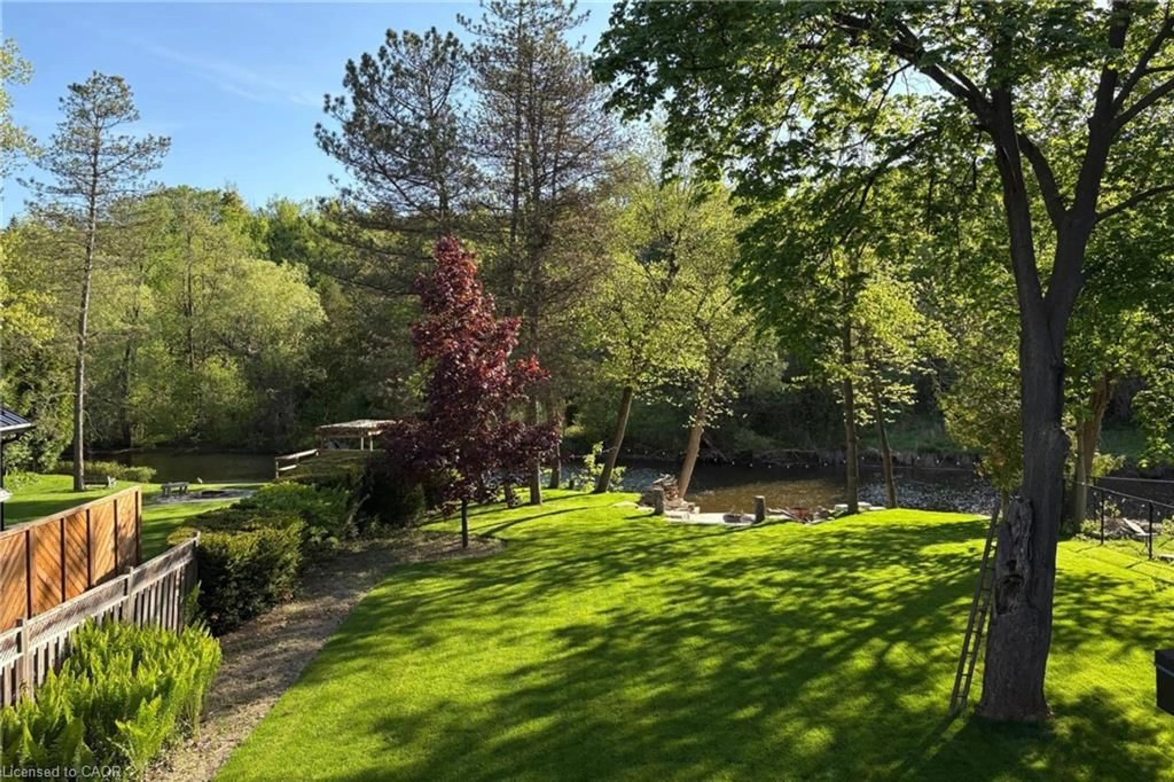 A pic from outside/outdoor area/front of a property/back of a property/a pic from drone, forest/trees view for 39 Credit Rd, Cheltenham Ontario L7C 3J3