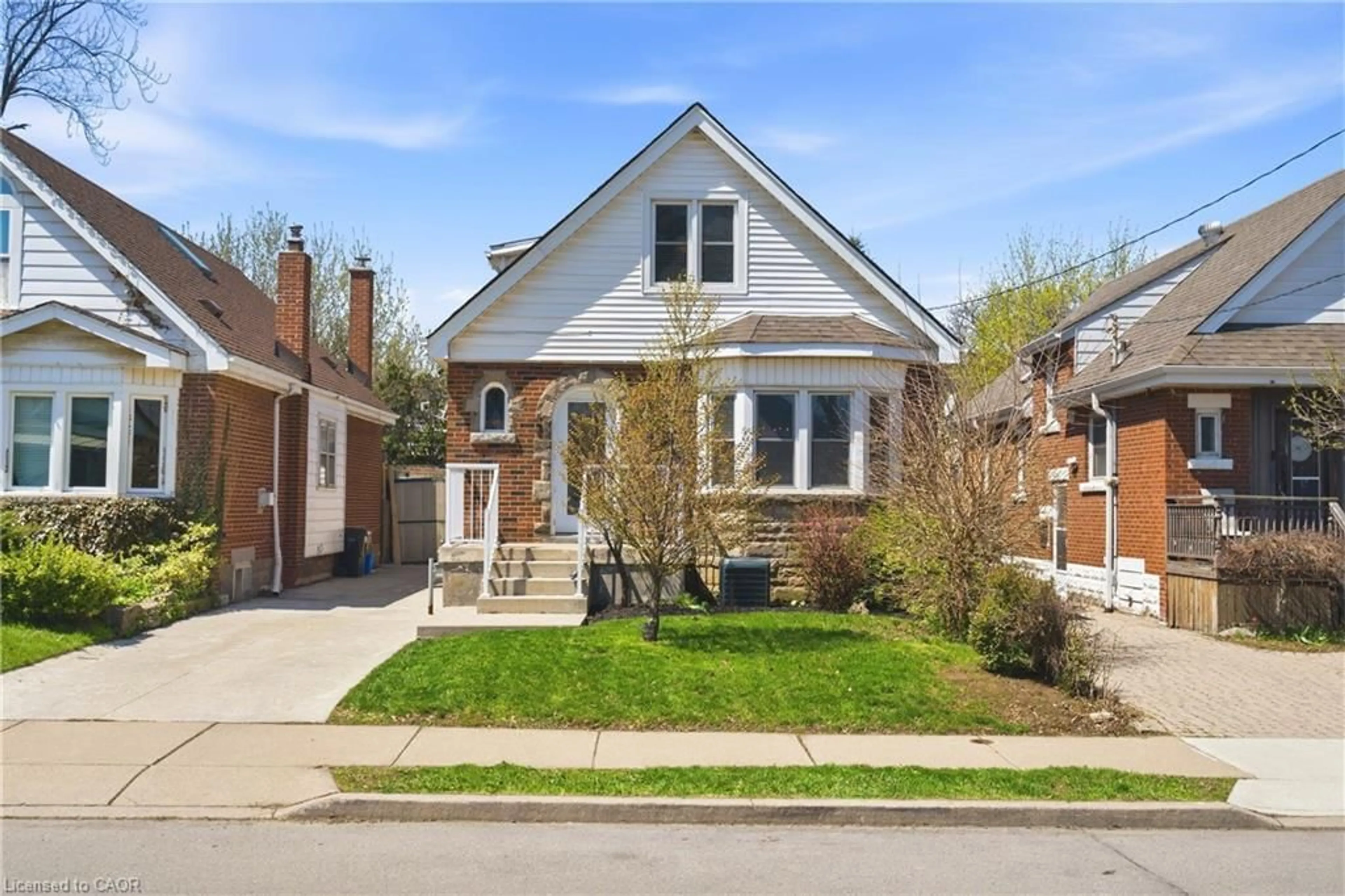 Home with brick exterior material, street for 148 Huxley Ave, Hamilton Ontario L8K 2R1