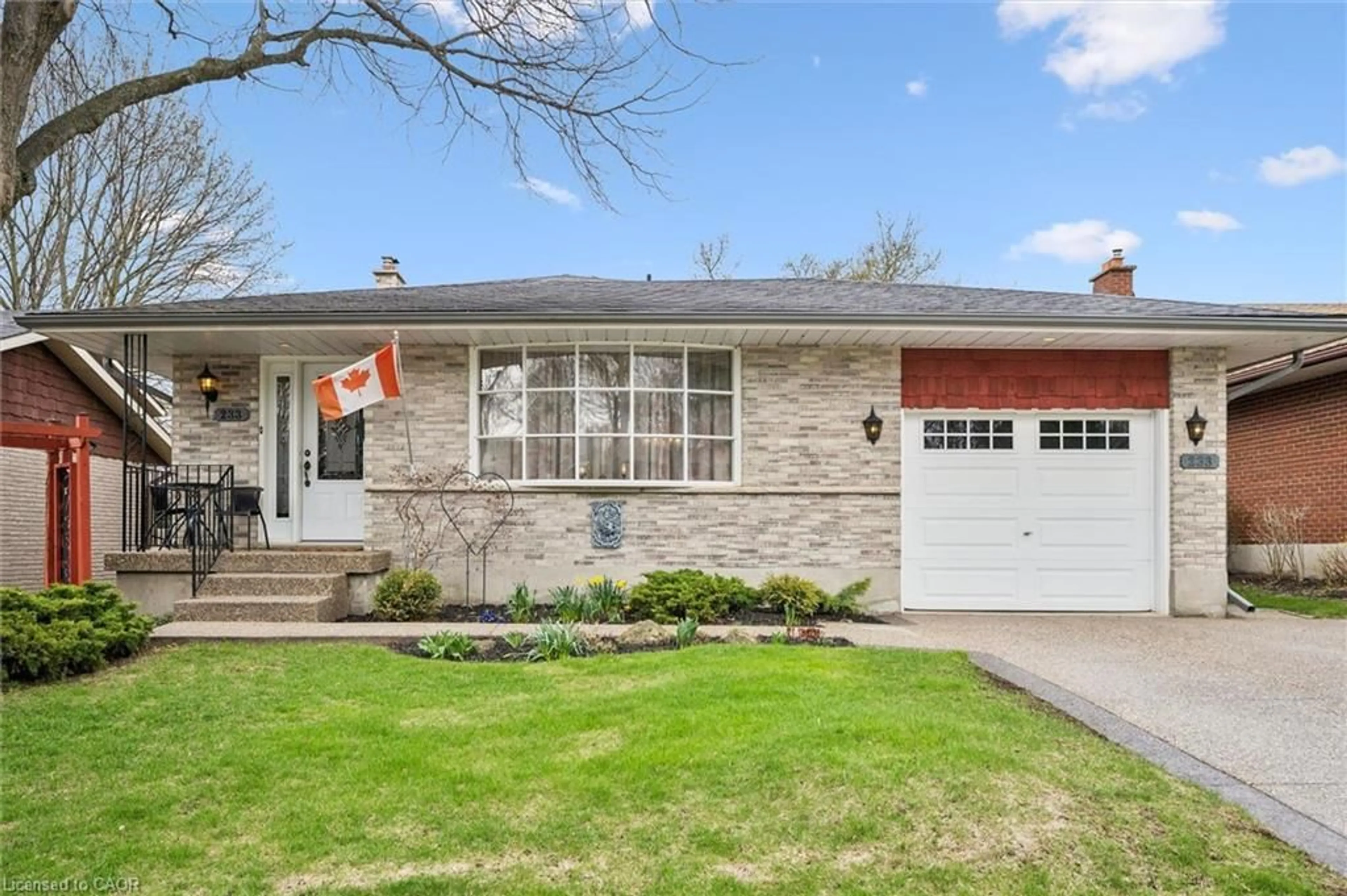 Home with brick exterior material, street for 233 Laurentian Dr, Kitchener Ontario N2E 2G5