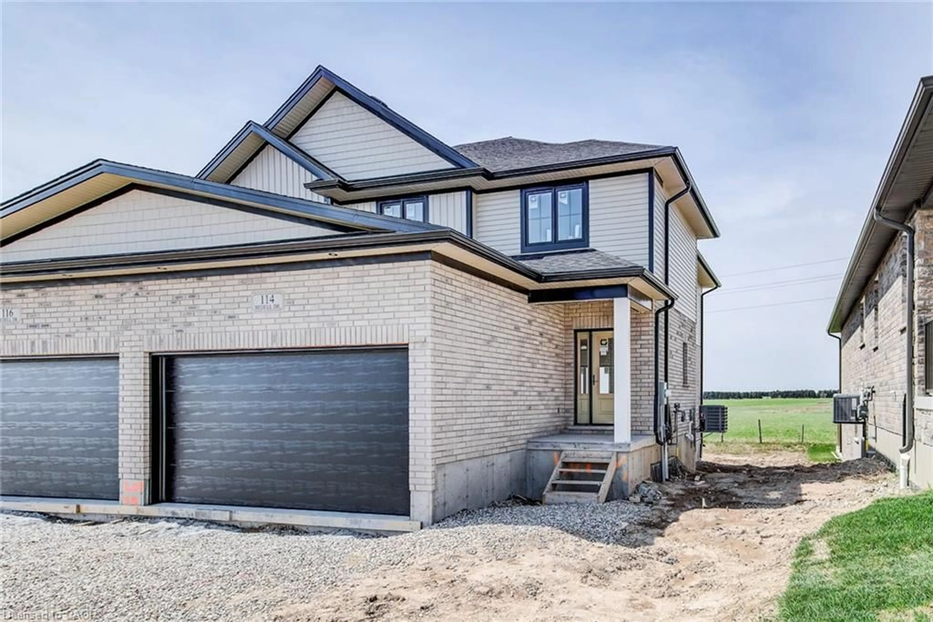 Home with brick exterior material, street for 114 Bedell Dr, Mapleton Ontario N0G 1P0