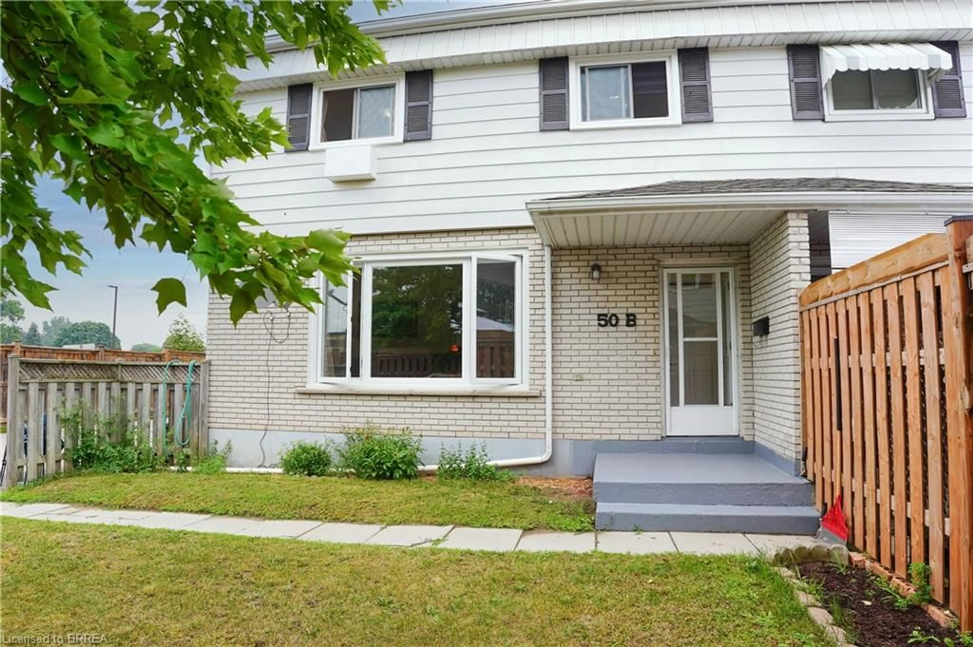 Home with vinyl exterior material, street for 50 Ewing Dr #B, Brantford Ontario N3R 5H8