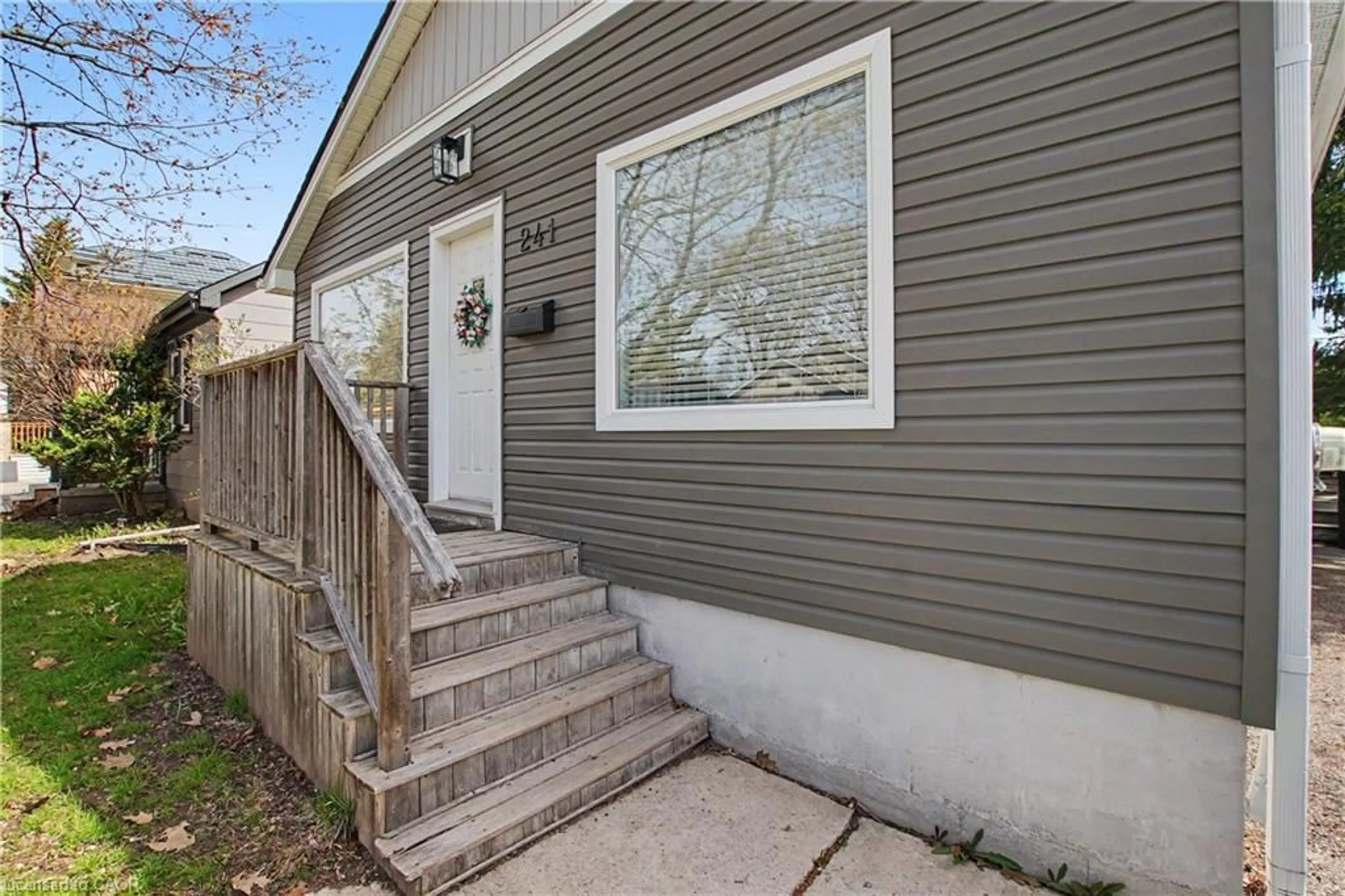 Home with vinyl exterior material, street for 241 Guelph Ave, Cambridge Ontario N3C 1A9