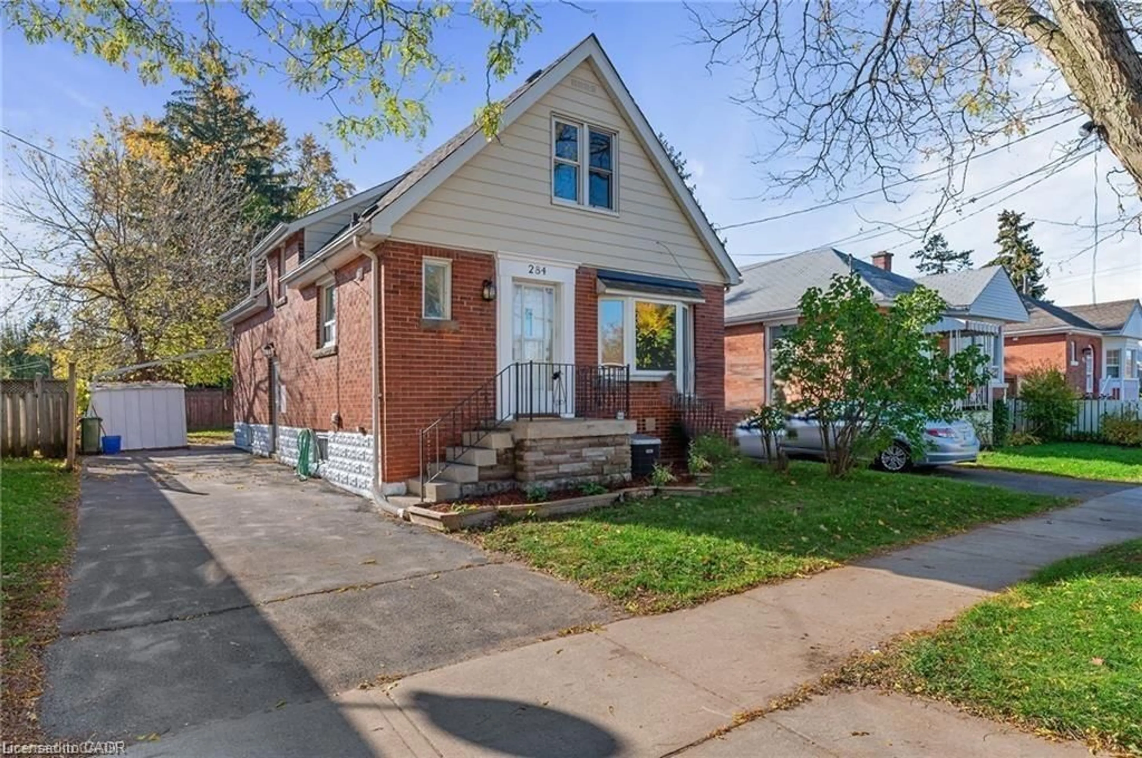 Home with brick exterior material, street for 284 Brucedale Ave, Hamilton Ontario L9A 1P9