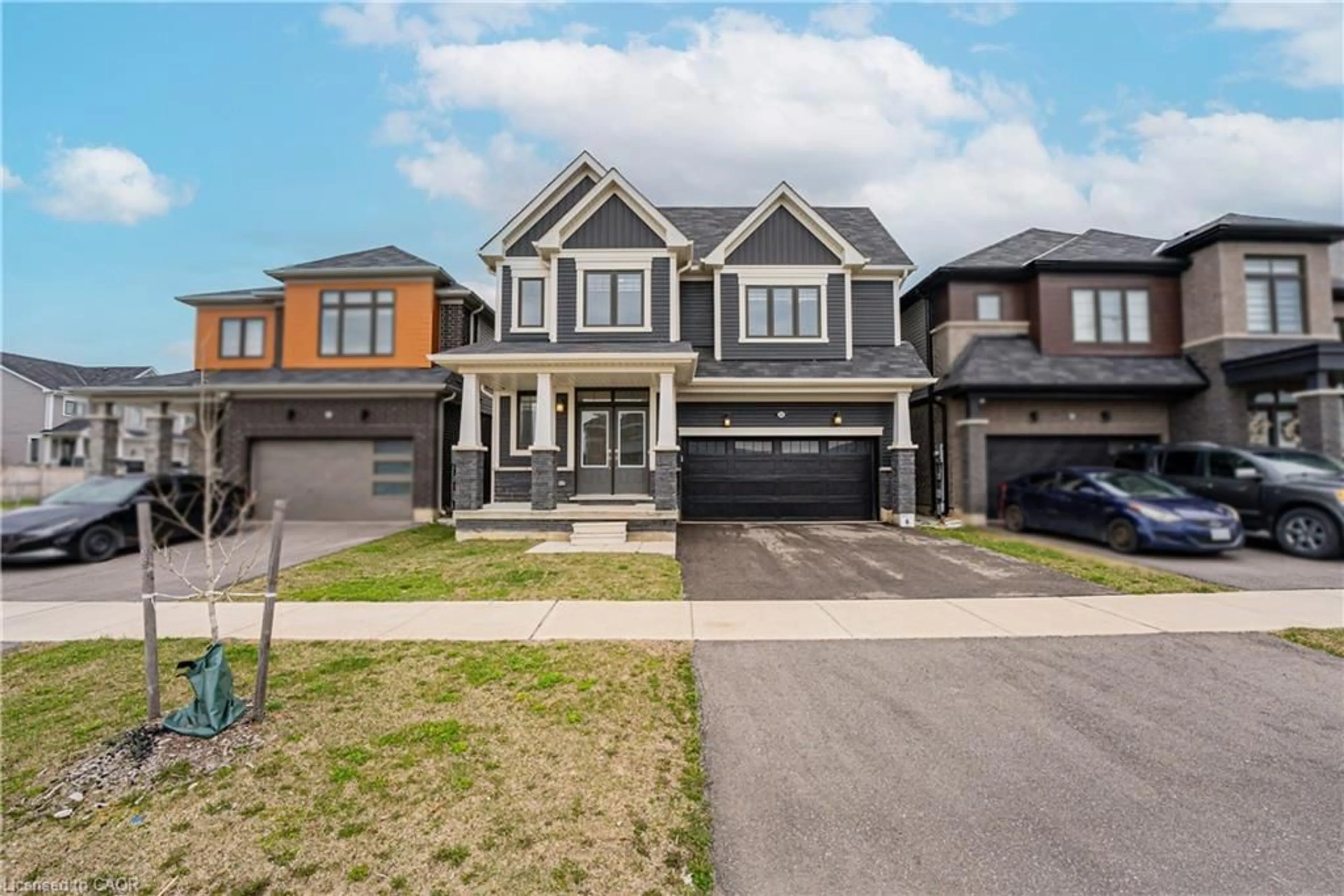 Home with brick exterior material, street for 22 Oaktree Dr, Caledonia Ontario N3W 0E6