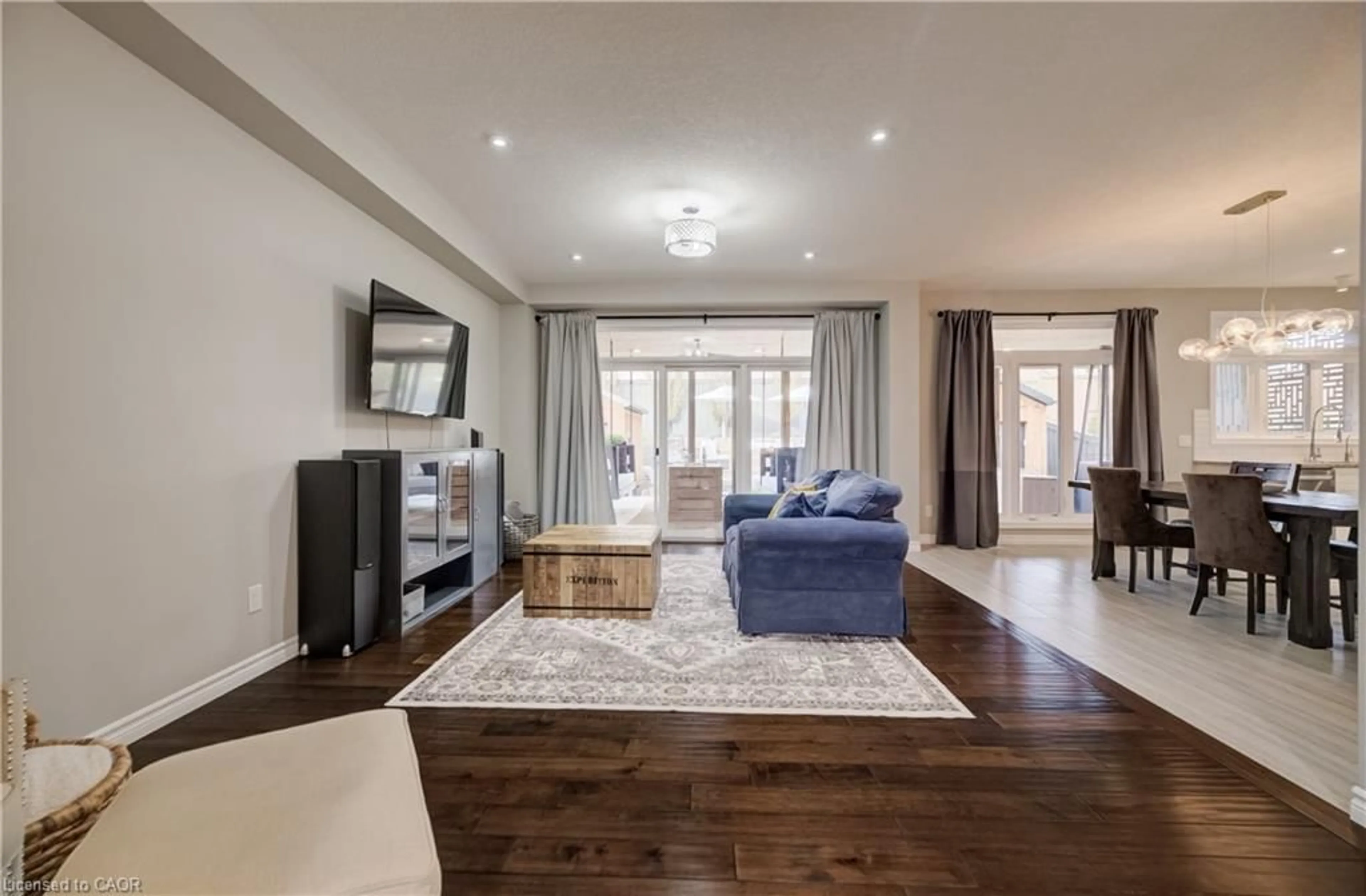 Living room with furniture, wood/laminate floor for 69 Theodore Schuler Blvd, New Hamburg Ontario N3A 0B9