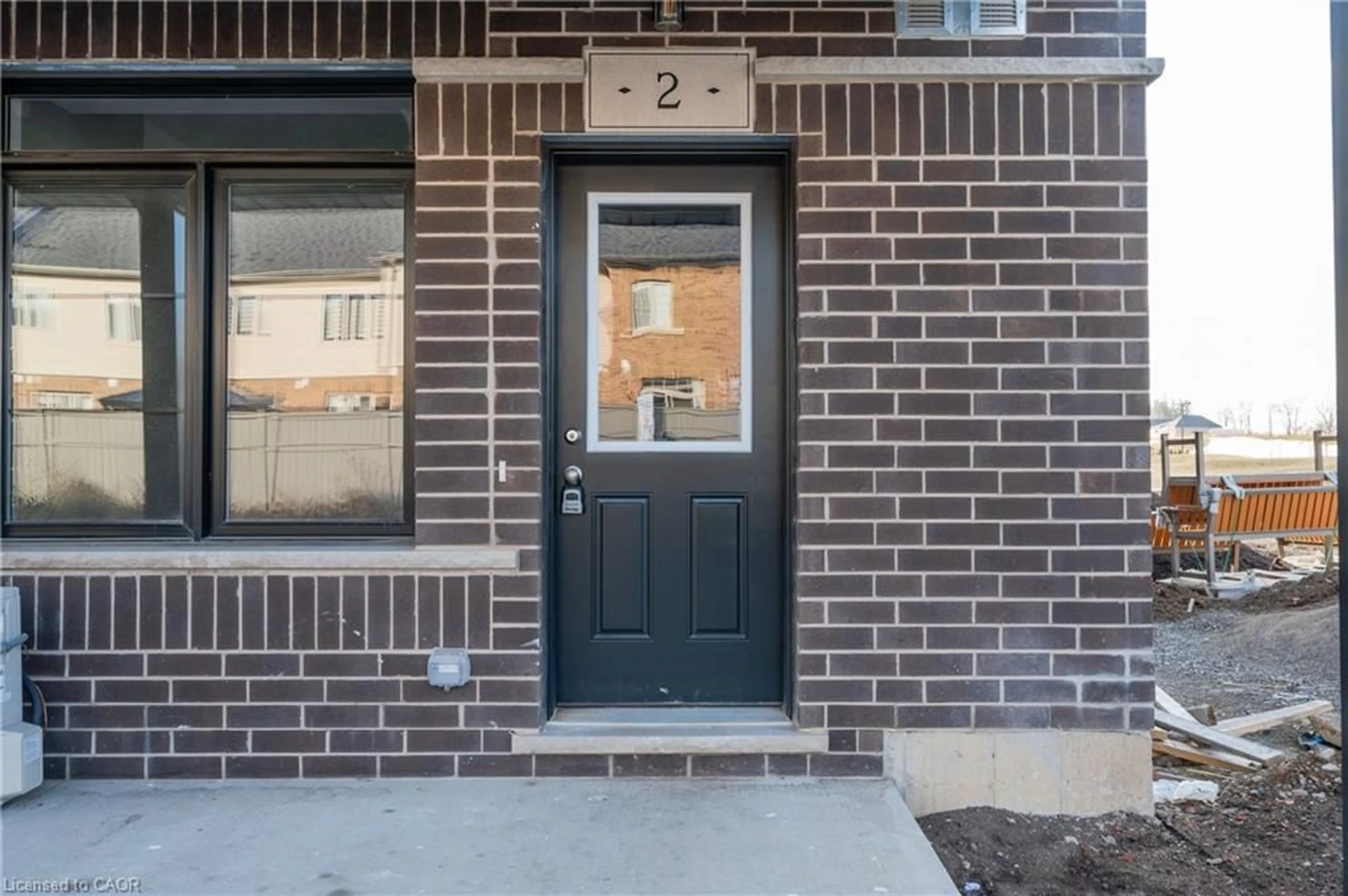 Home with brick exterior material, street for 2 Oat Lane, Kitchener Ontario N2R 0T1