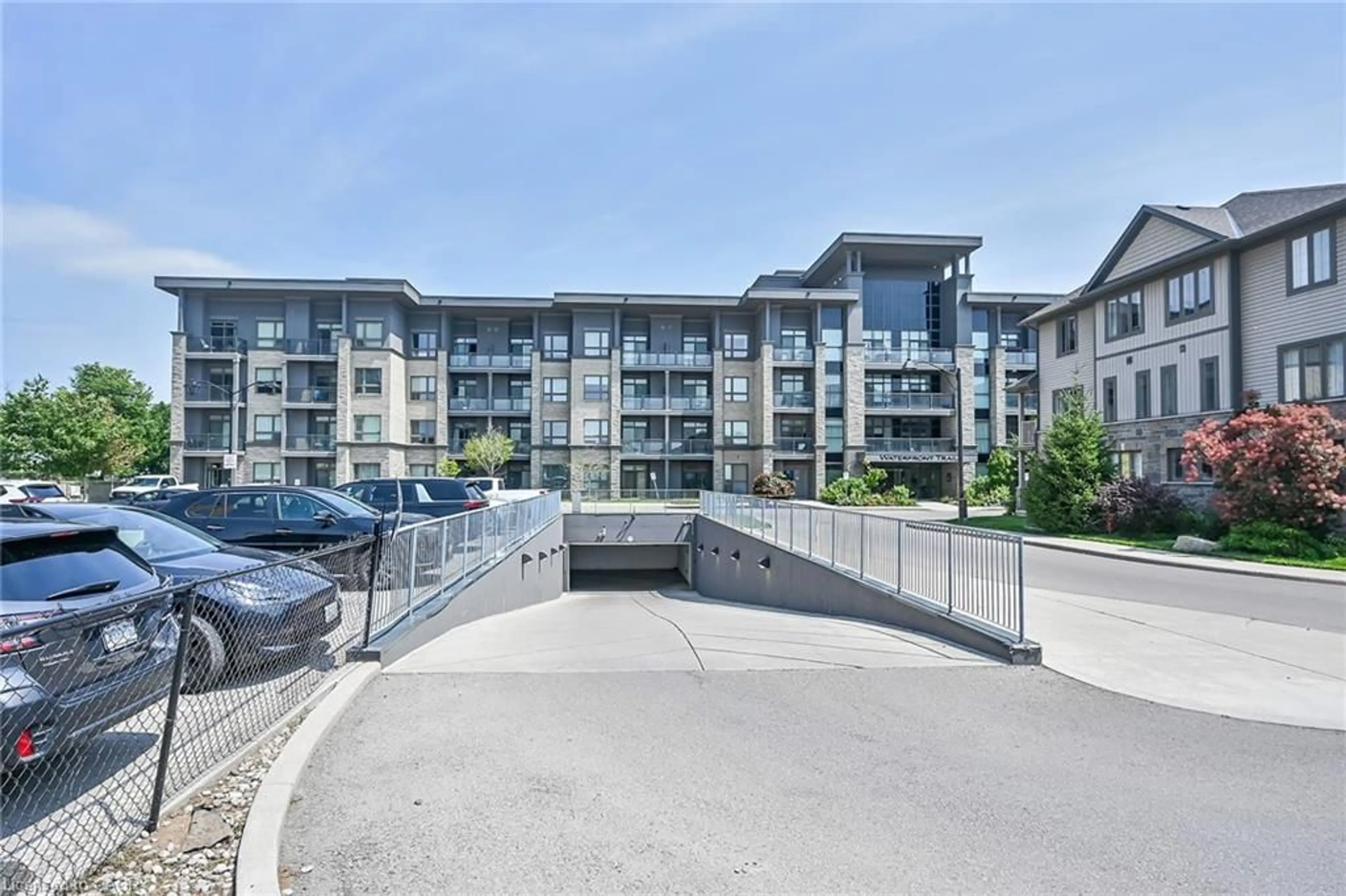 A pic from outside/outdoor area/front of a property/back of a property/a pic from drone, unknown for 35 Southshore Cres #311, Hamilton Ontario L8W 3W6
