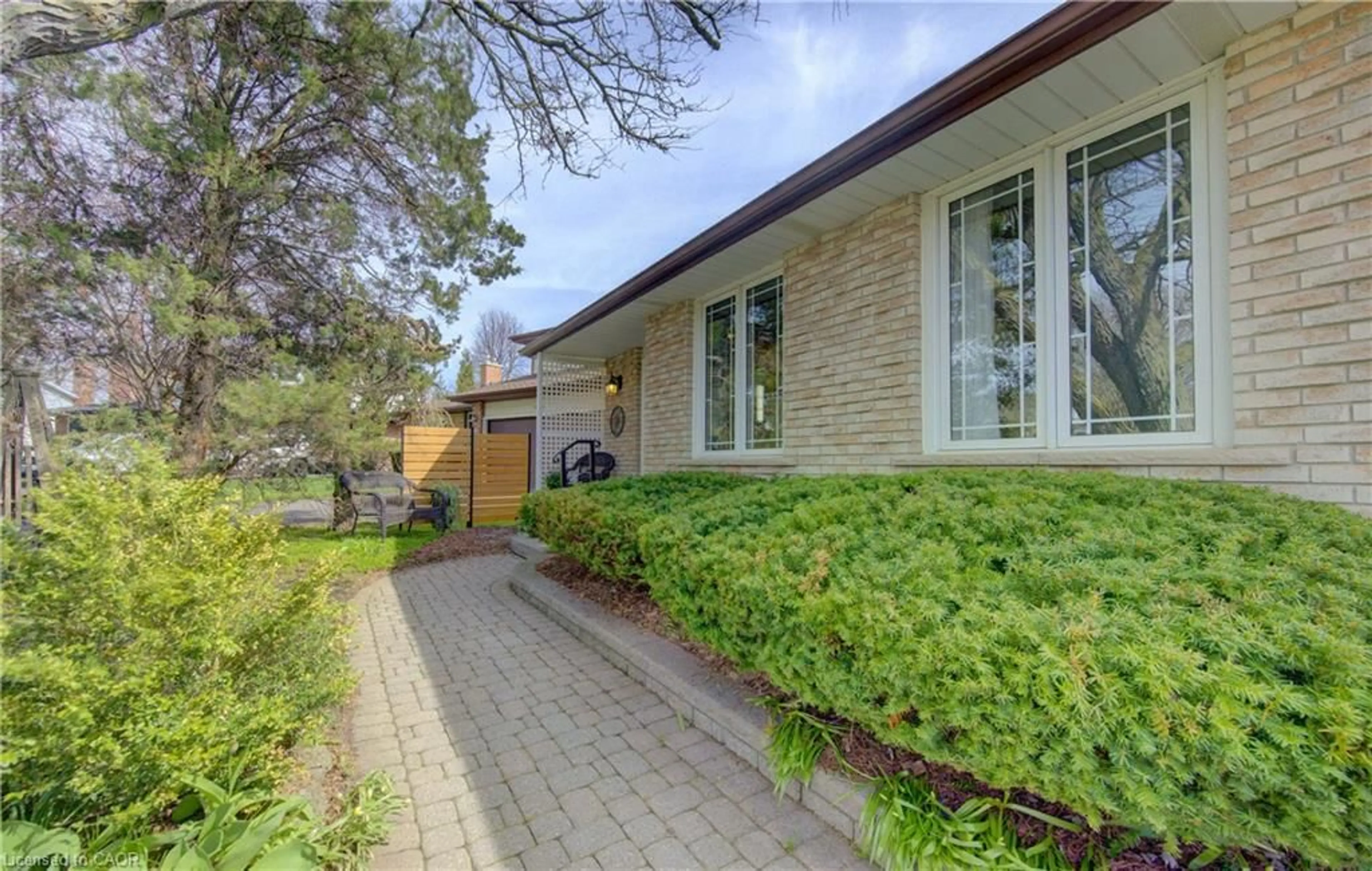 Home with brick exterior material, street for 18 Ripley Cres, Kitchener Ontario N2N 1V4