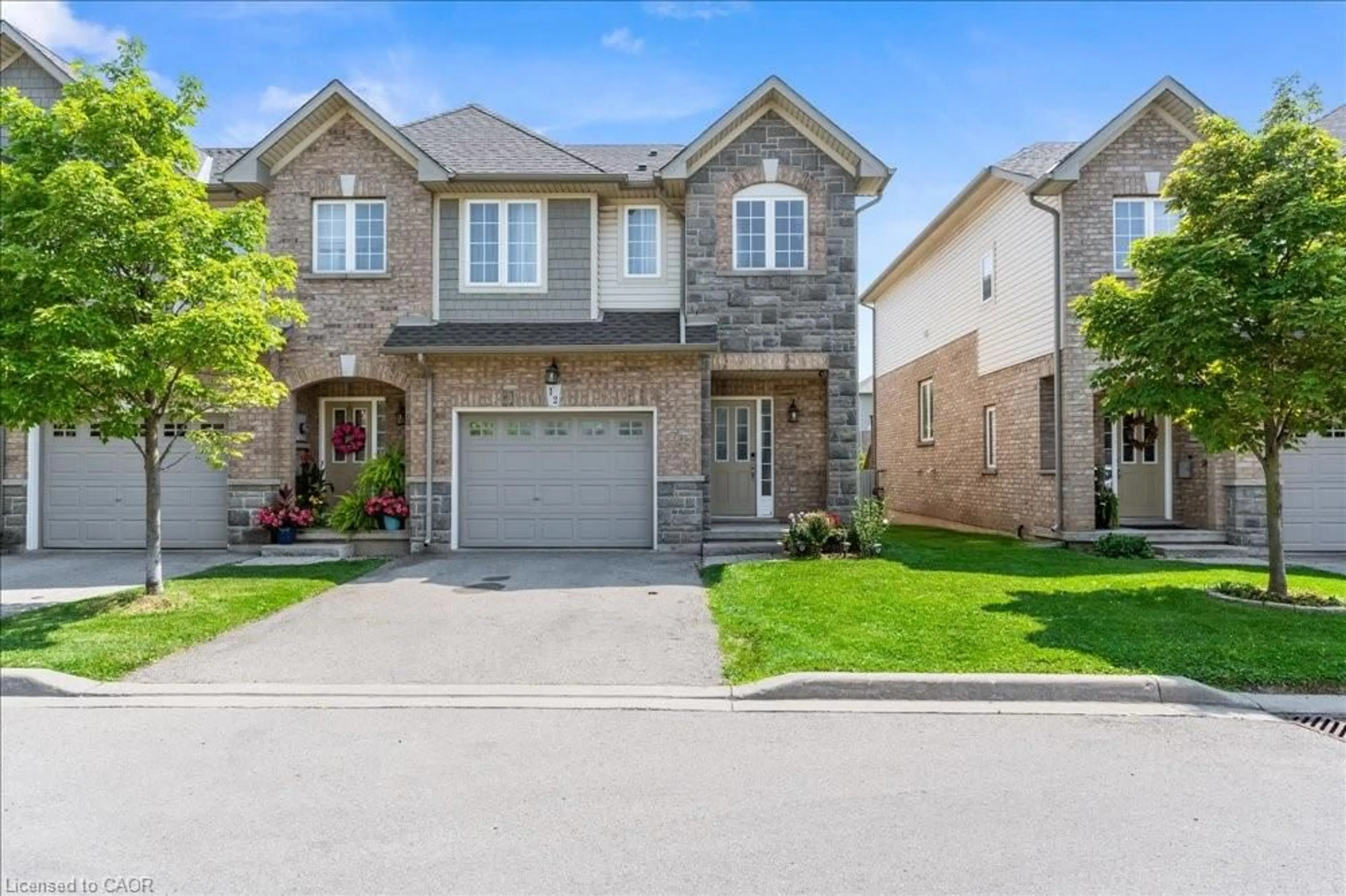 Home with brick exterior material, street for 40 Dartmouth Gate #12, Stoney Creek Ontario L8E 0C4