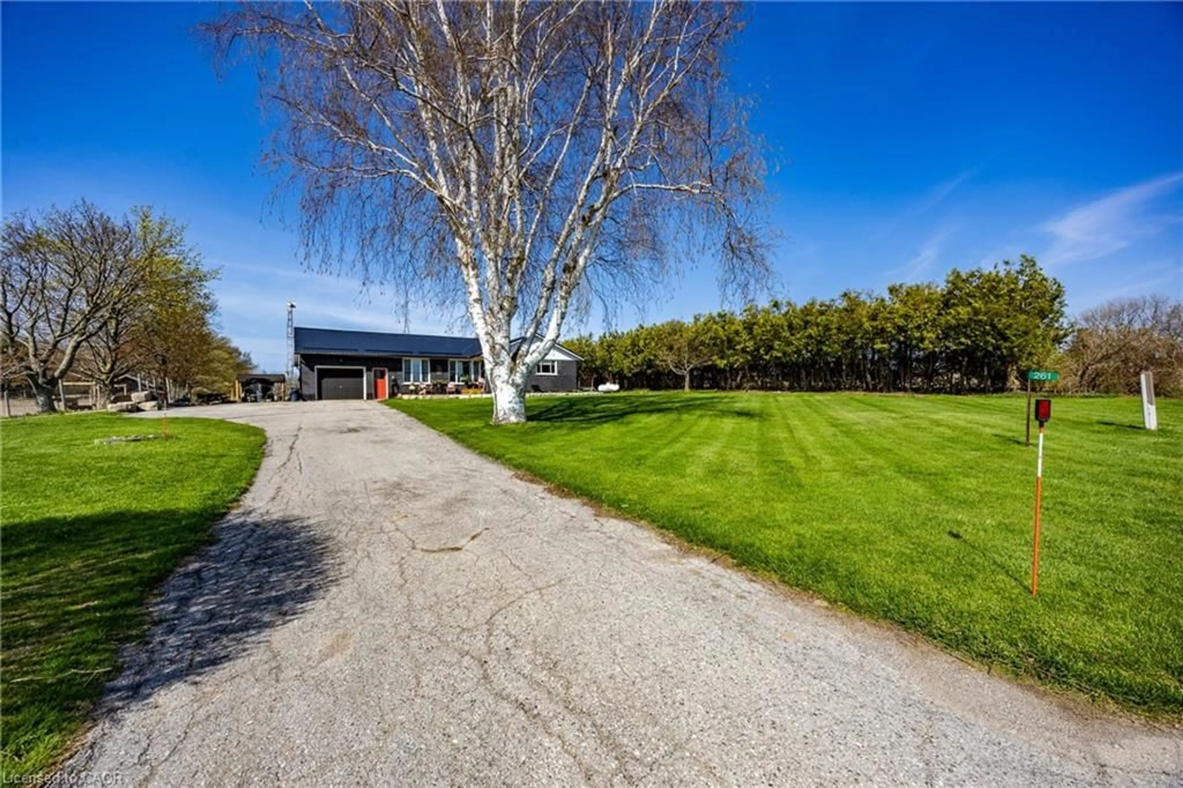 A pic from outside/outdoor area/front of a property/back of a property/a pic from drone, street for 261 West Quarter Line Rd, Port Rowan Ontario N0E 1M0