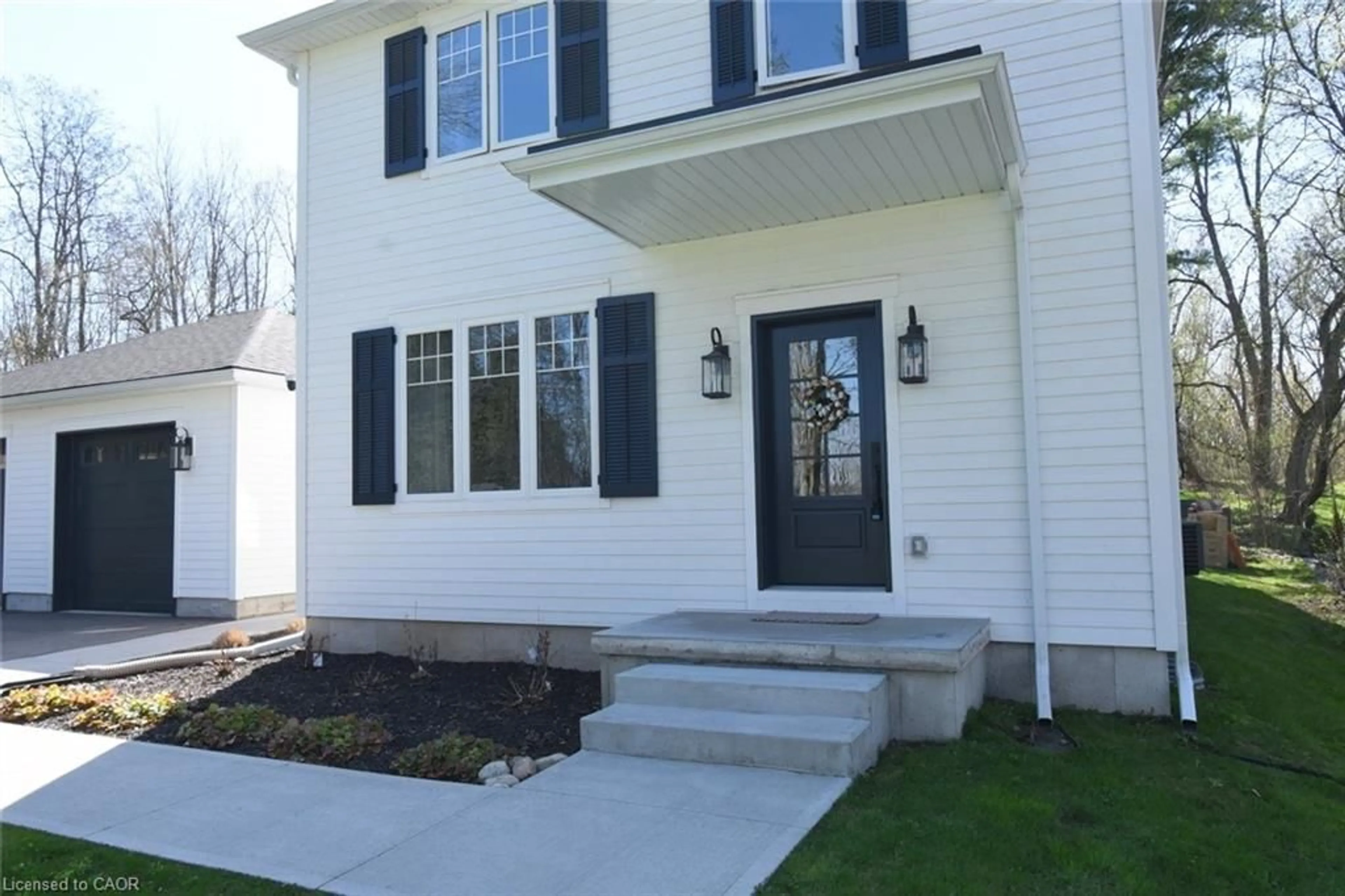 Home with vinyl exterior material, street for 163 Willow St, Paris Ontario N3L 3E2