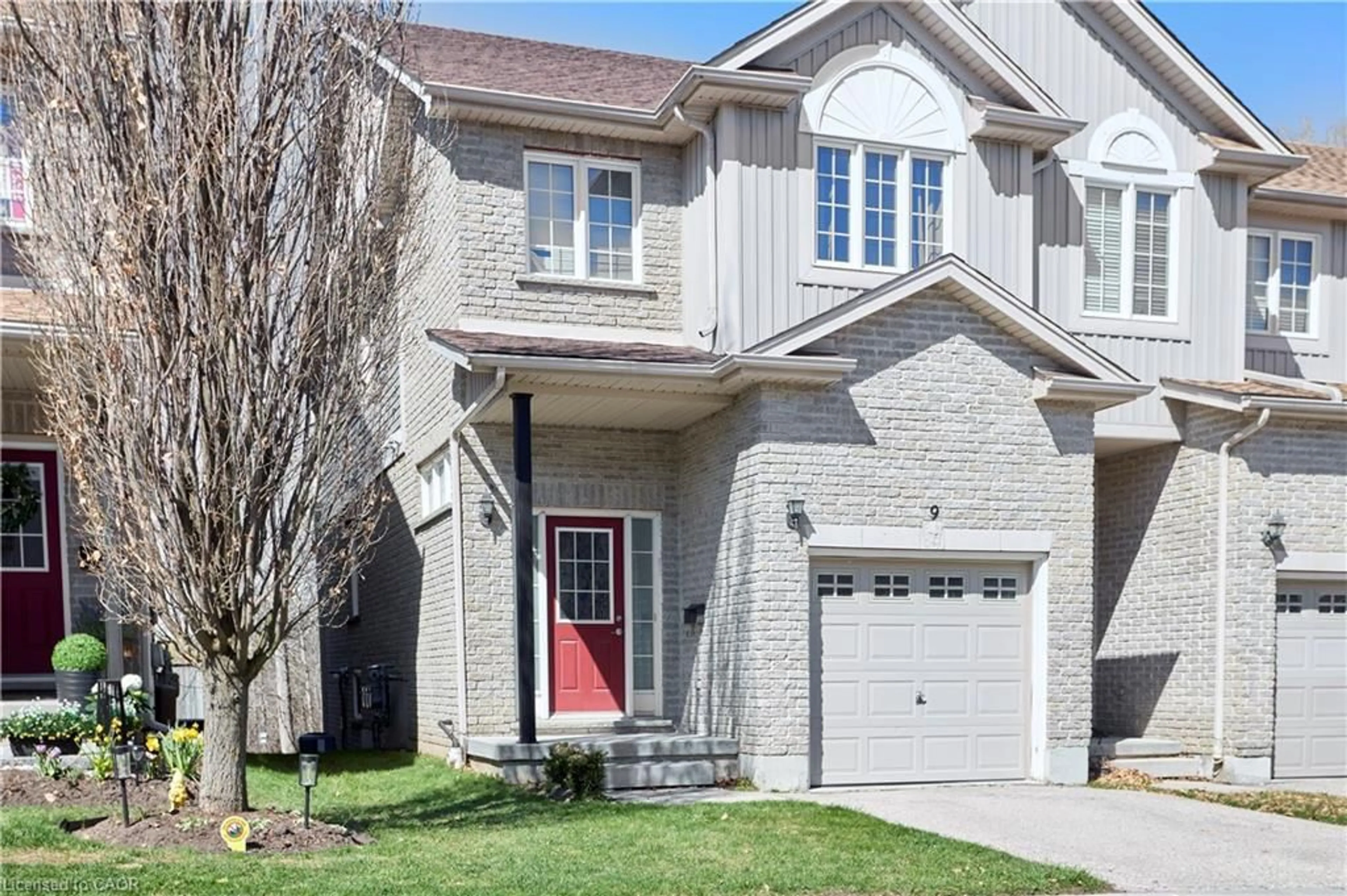 Home with brick exterior material, street for 105 Pinnacle Dr #9, Kitchener Ontario N2P 1B8