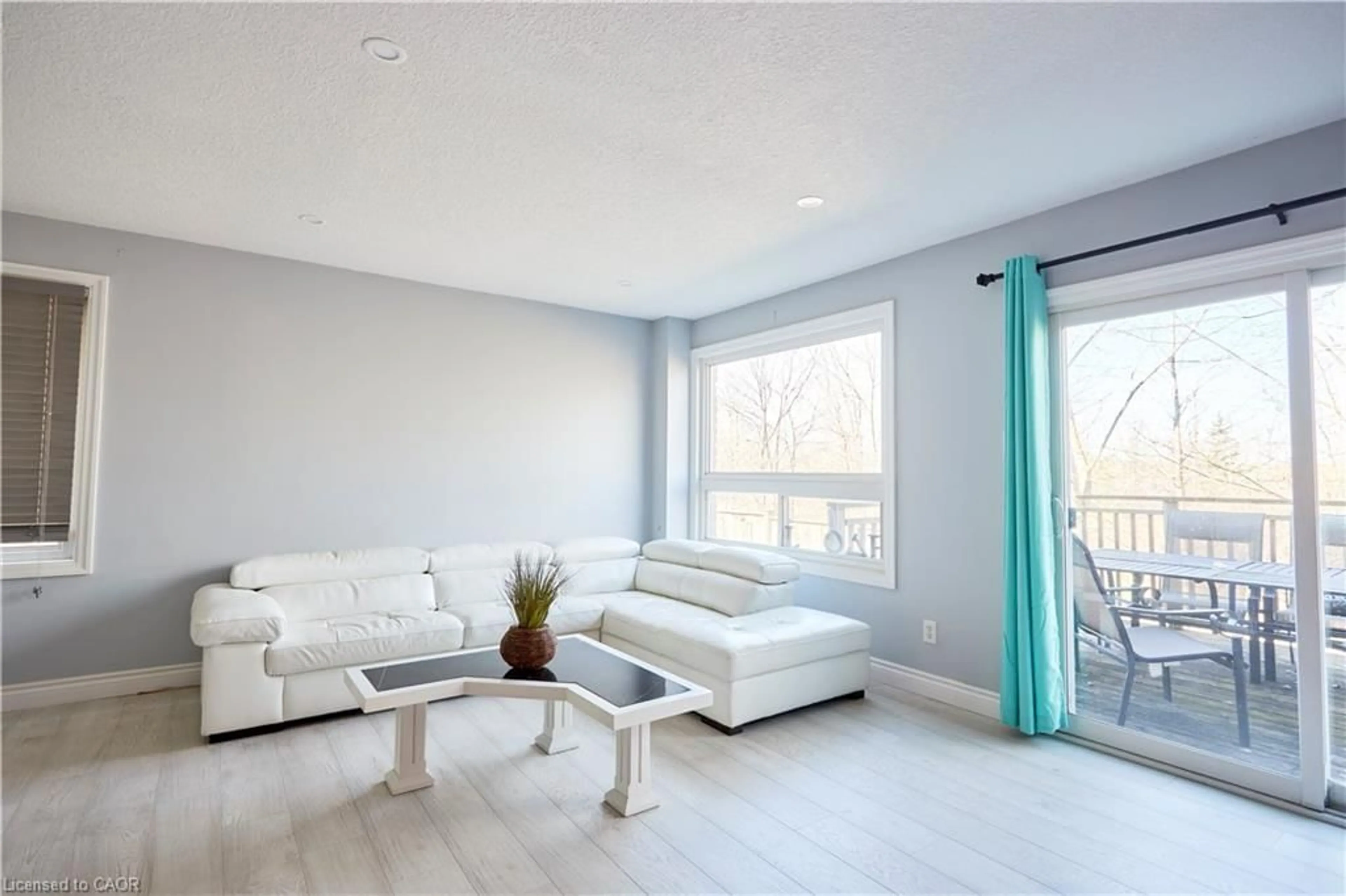 Living room with furniture, unknown for 105 Pinnacle Dr #9, Kitchener Ontario N2P 1B8