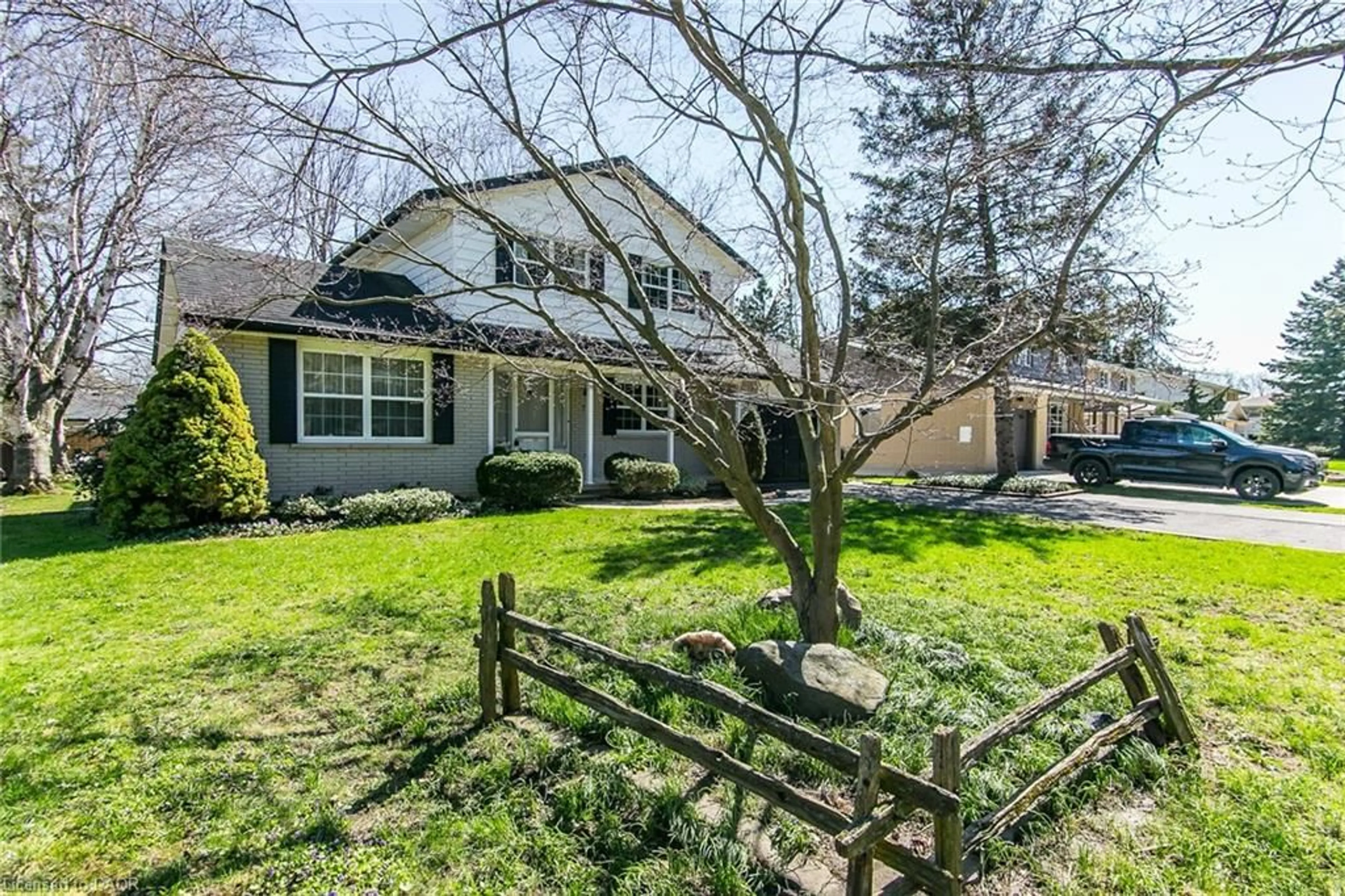 A pic from outside/outdoor area/front of a property/back of a property/a pic from drone, street for 70 Inwood Cres, Kitchener Ontario N2M 2M1