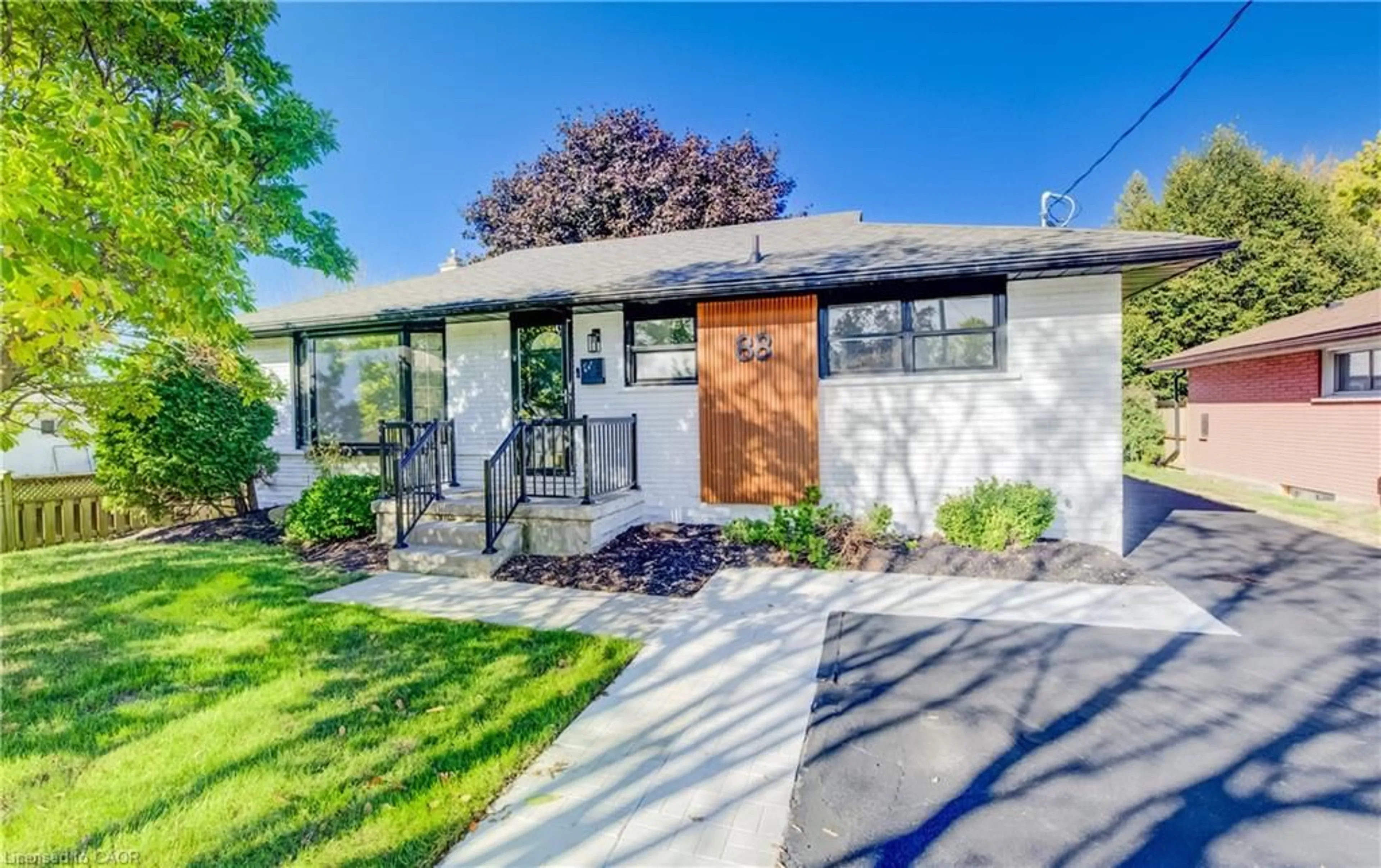Home with brick exterior material, street for 88 Woodhaven Rd, Kitchener Ontario N2C 1V1