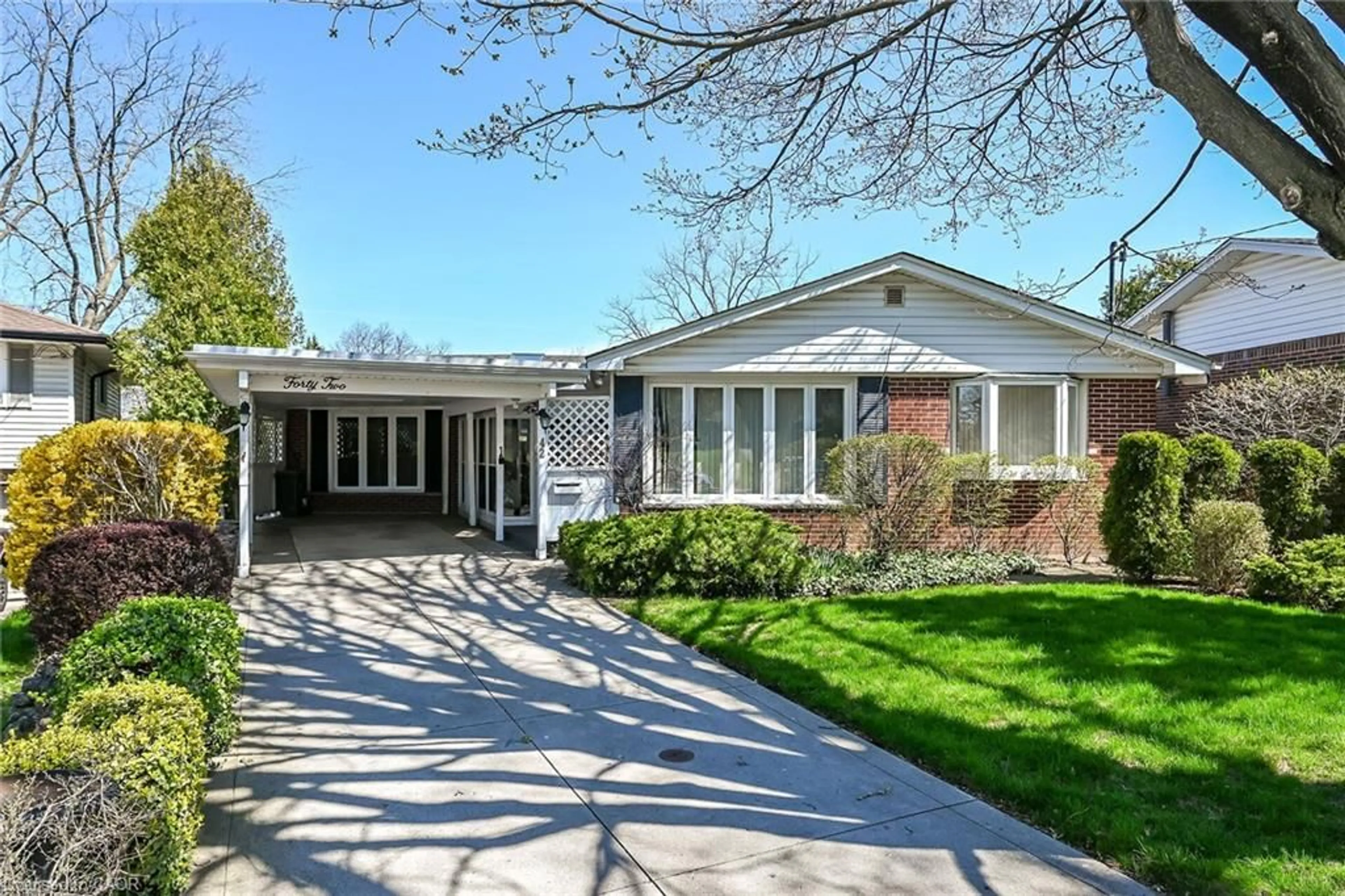 Home with brick exterior material, street for 42 Holbrook Rd, Hamilton Ontario L9C 2H2