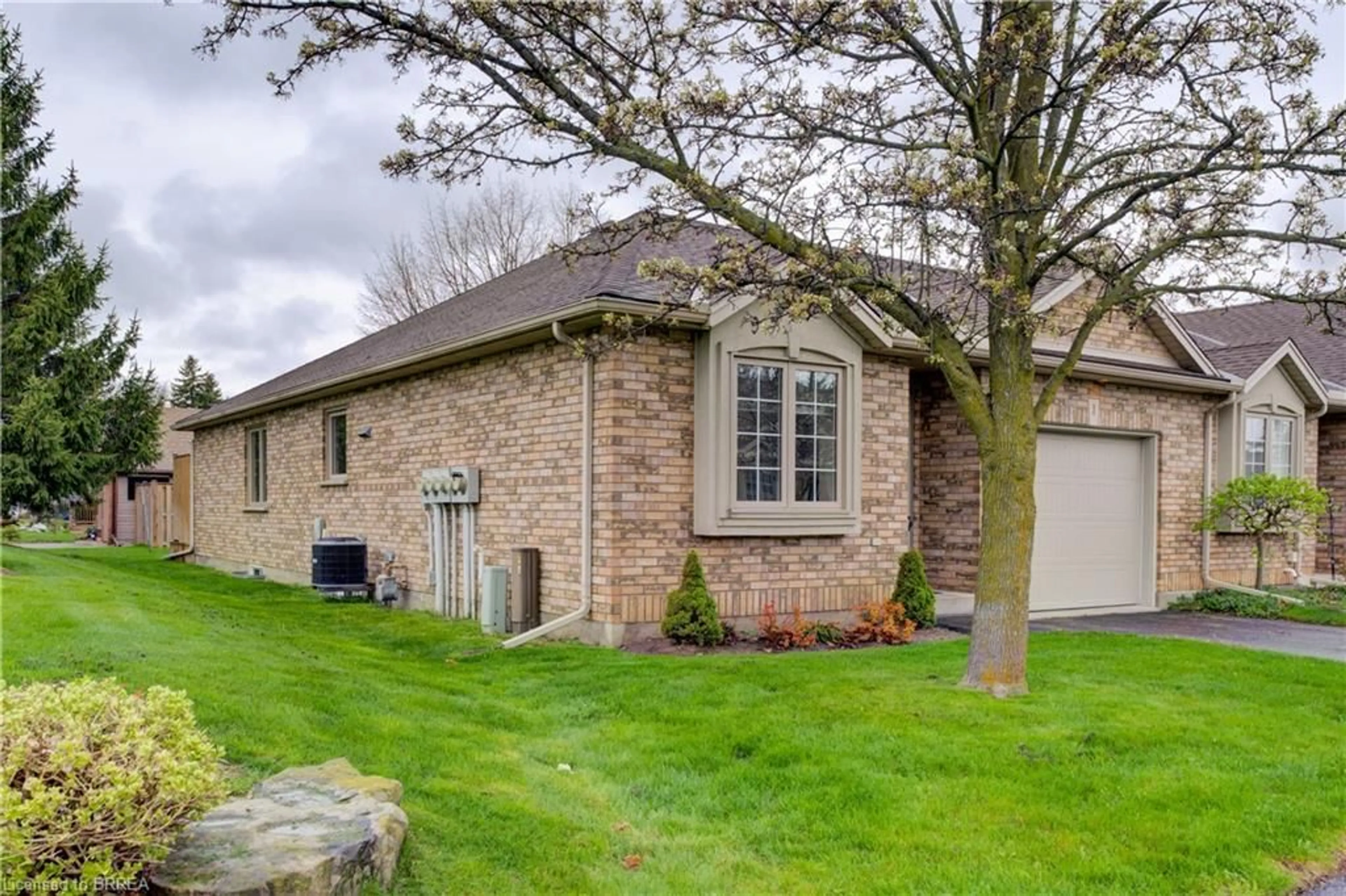 Home with brick exterior material, street for 110 Somerset Rd #1, Brantford Ontario N3R 5A8