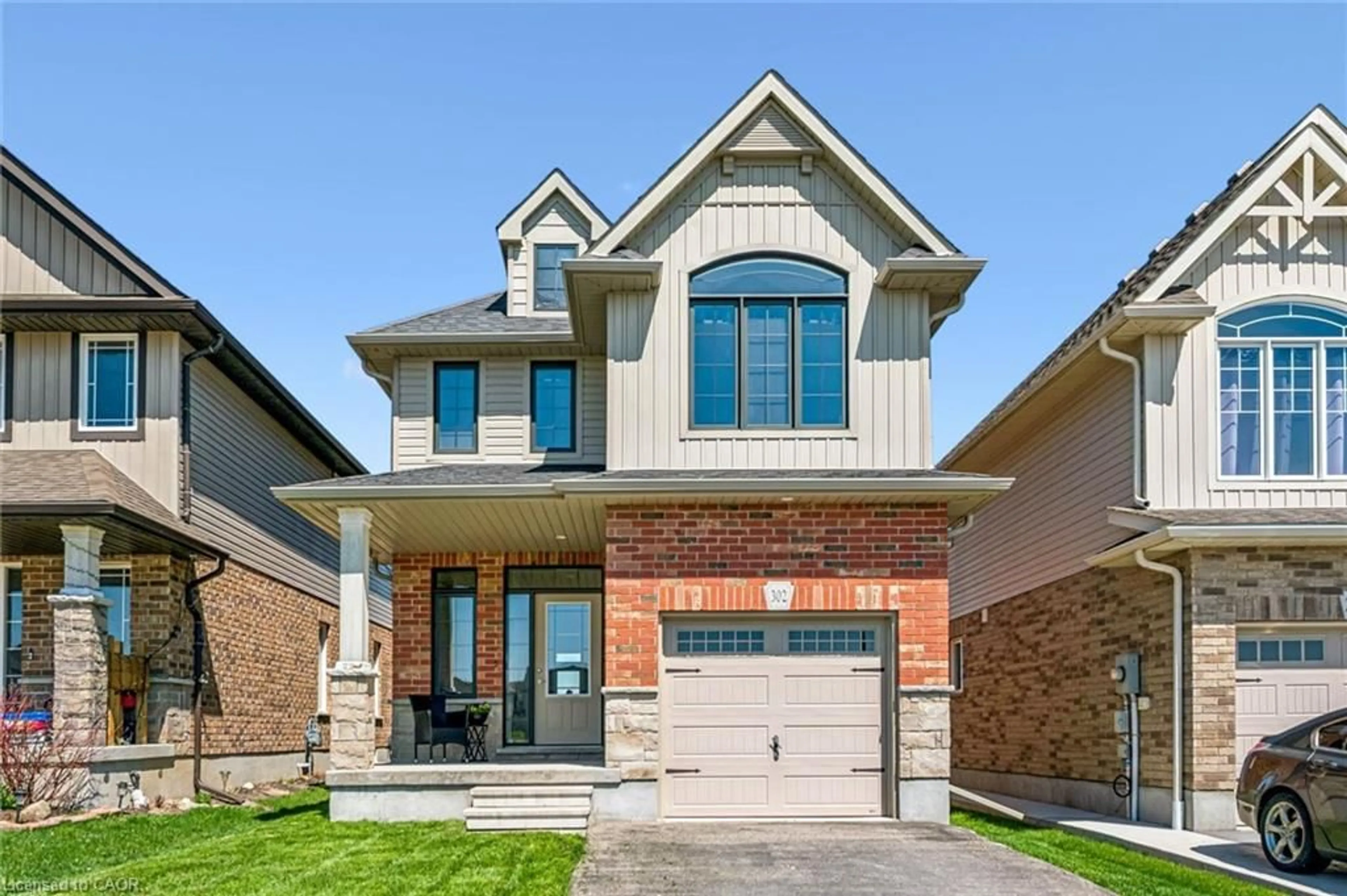 Home with brick exterior material, street for 302 William St, Elmira Ontario N3B 0B5