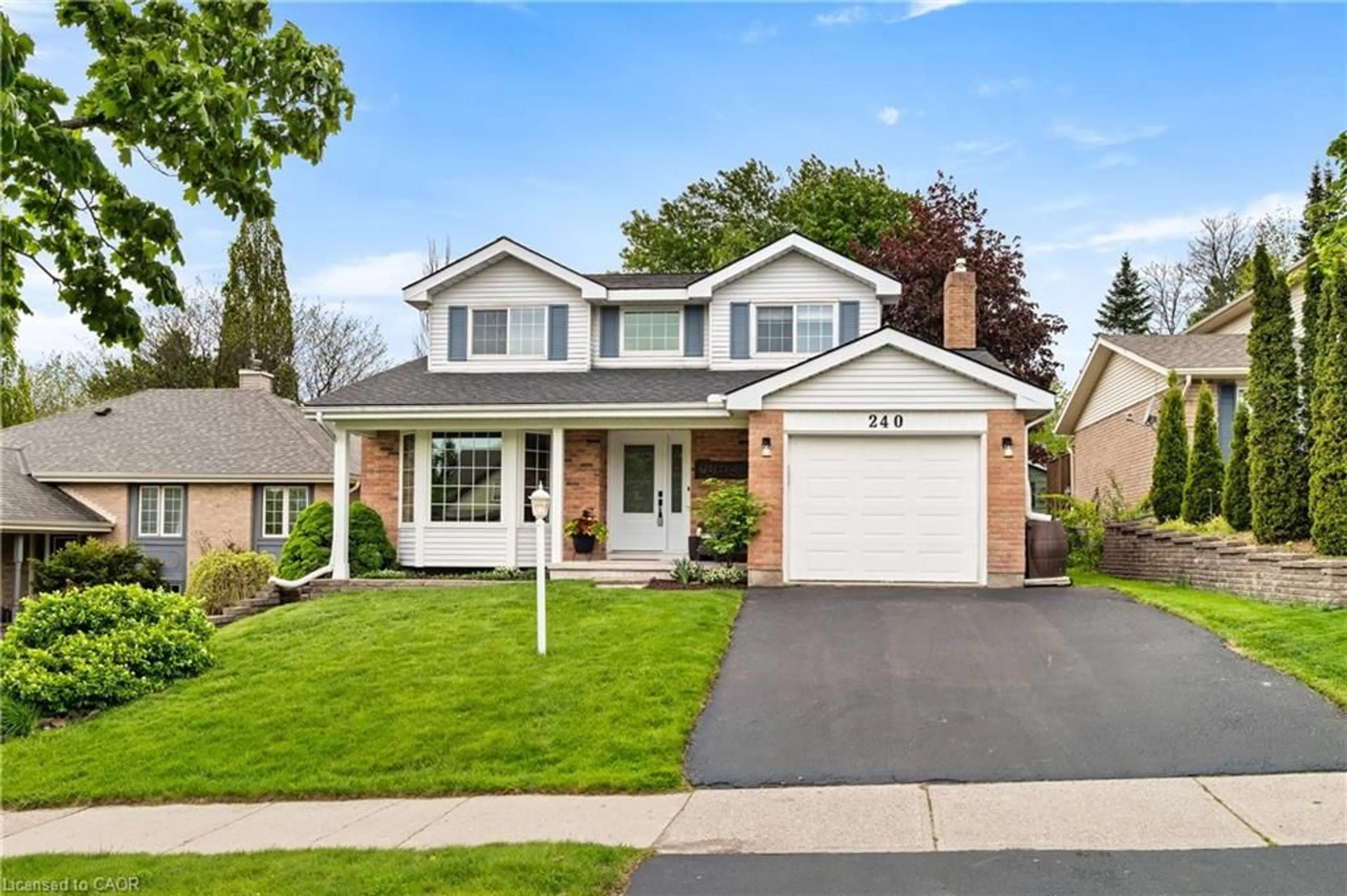 Home with vinyl exterior material, street for 240 Grand River Blvd, Kitchener Ontario N2A 3G8