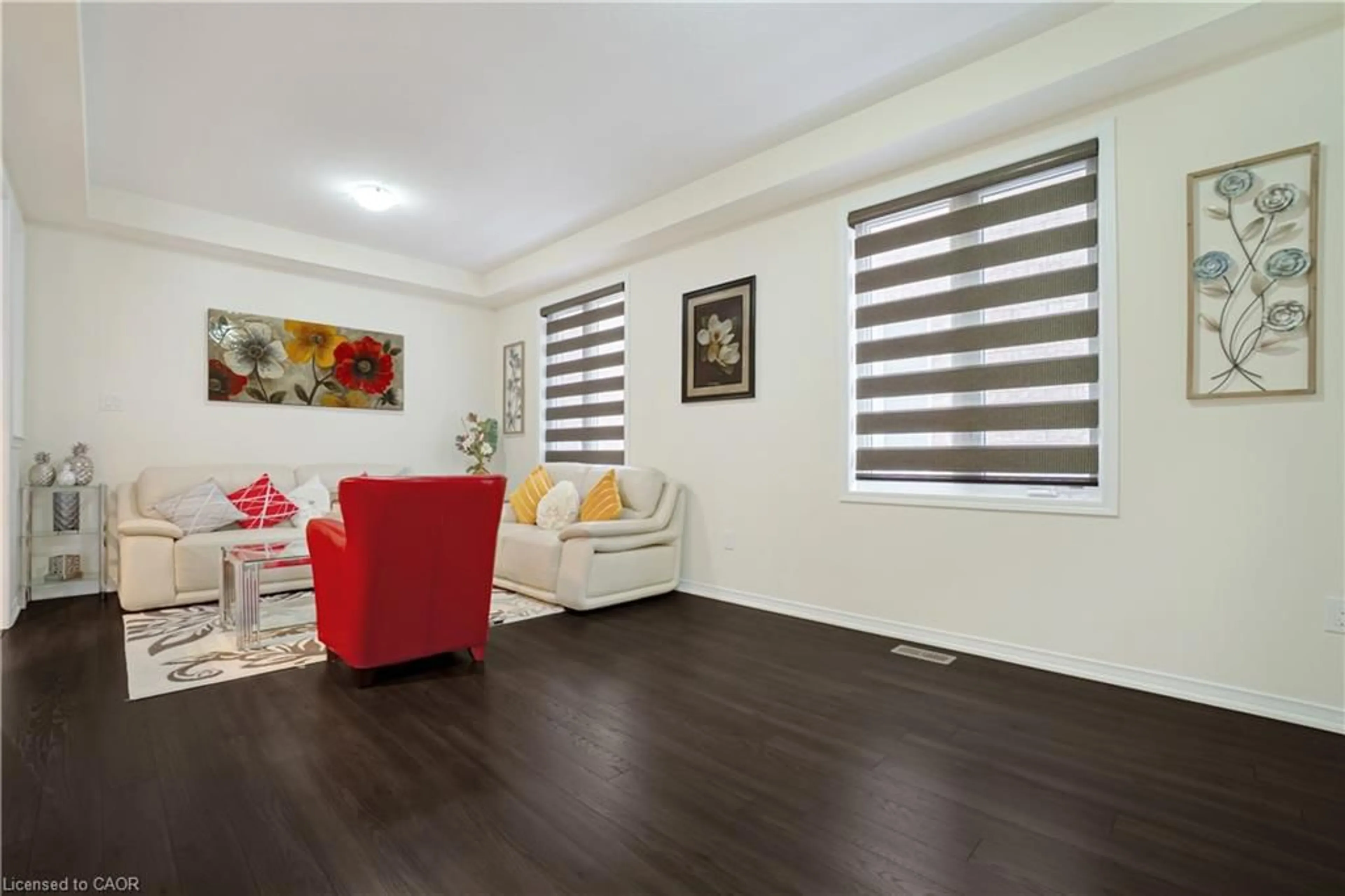 Living room with furniture, wood/laminate floor for 109 Gillespie Dr, Brantford Ontario N3T 0K5