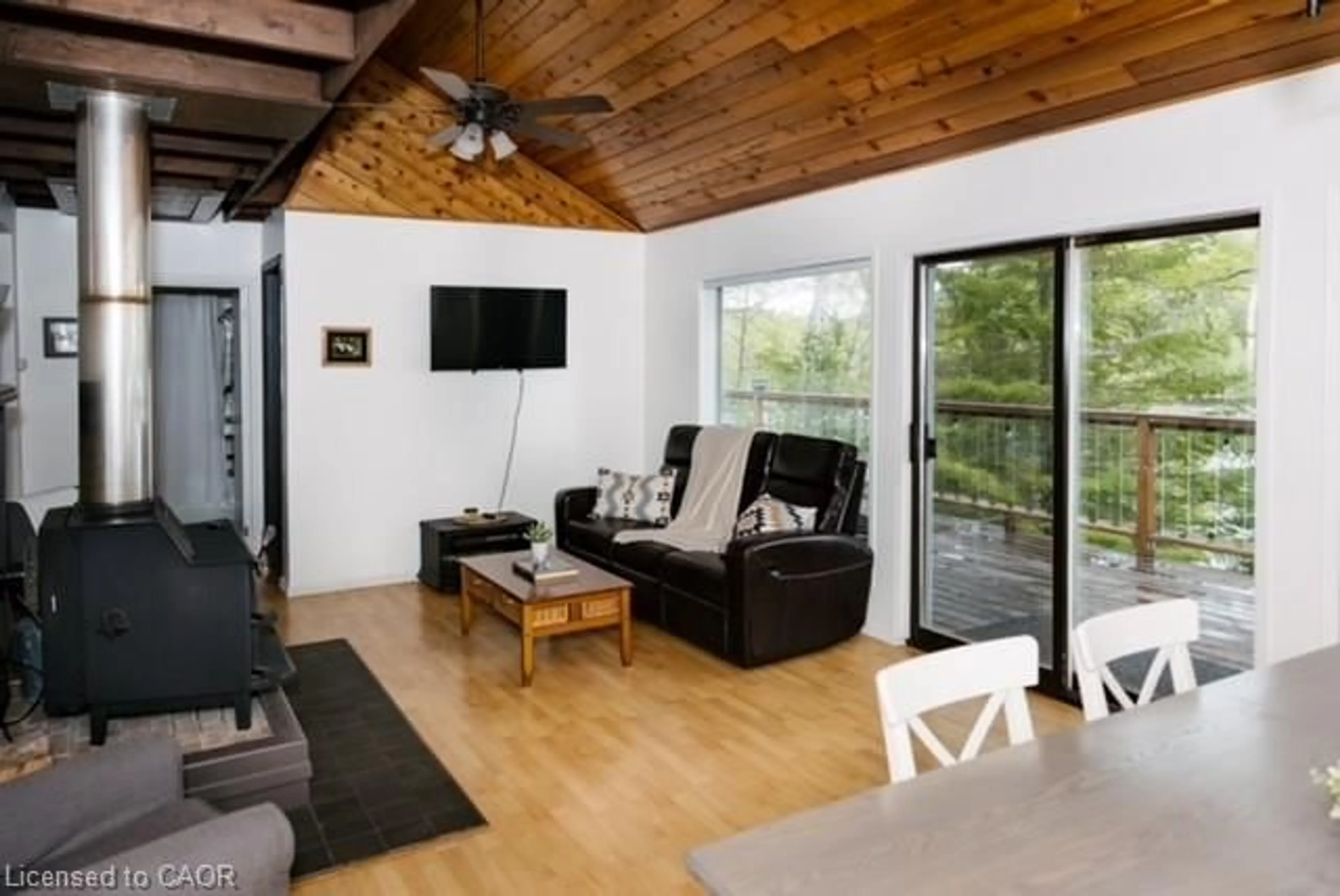 Living room with furniture, wood/laminate floor for 1220 Portage Lake Rd, Haliburton Ontario K0M 1S0