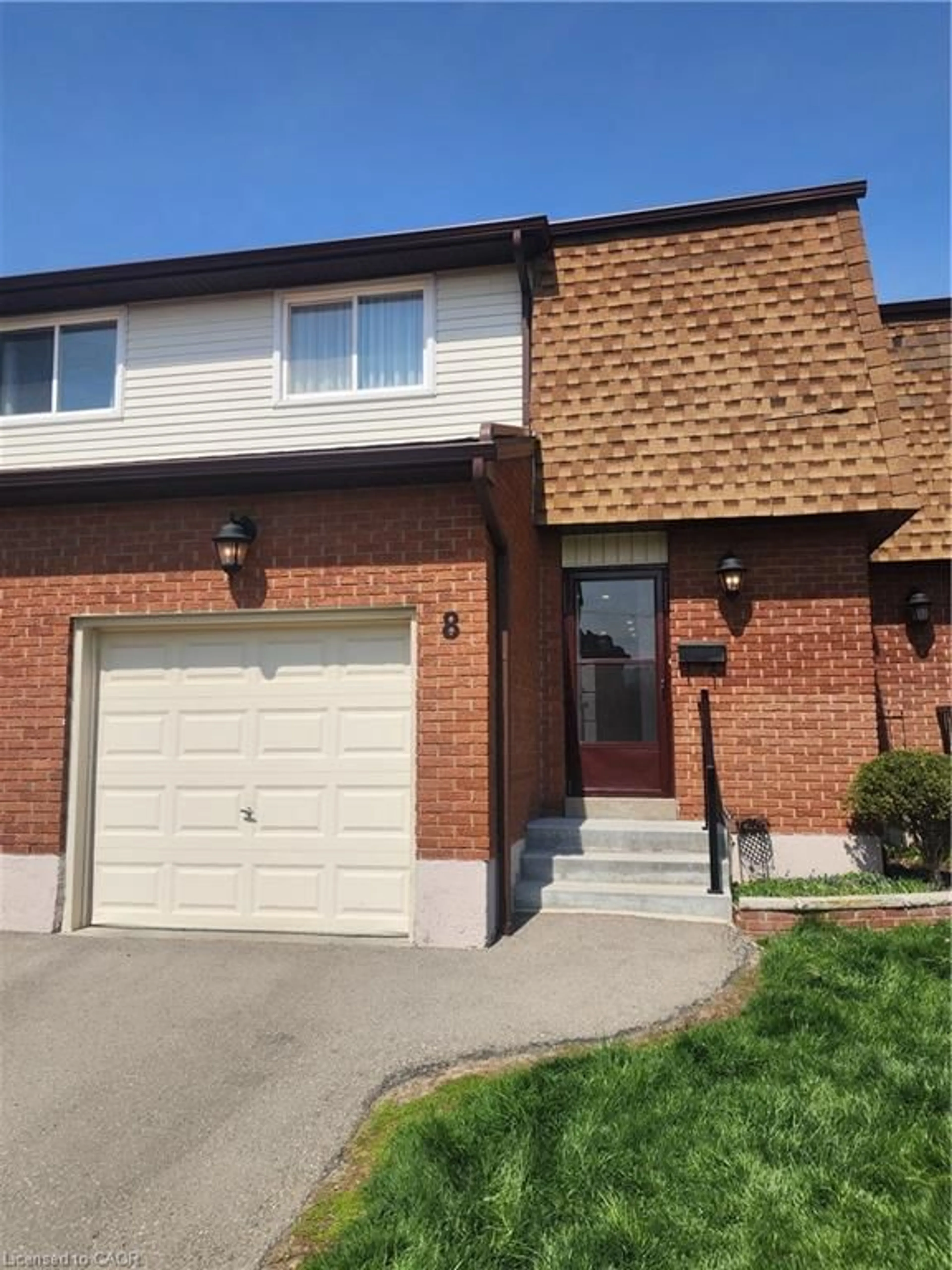 Home with brick exterior material, street for 899 Stone Church Rd #8, Hamilton Ontario L8W 1B2