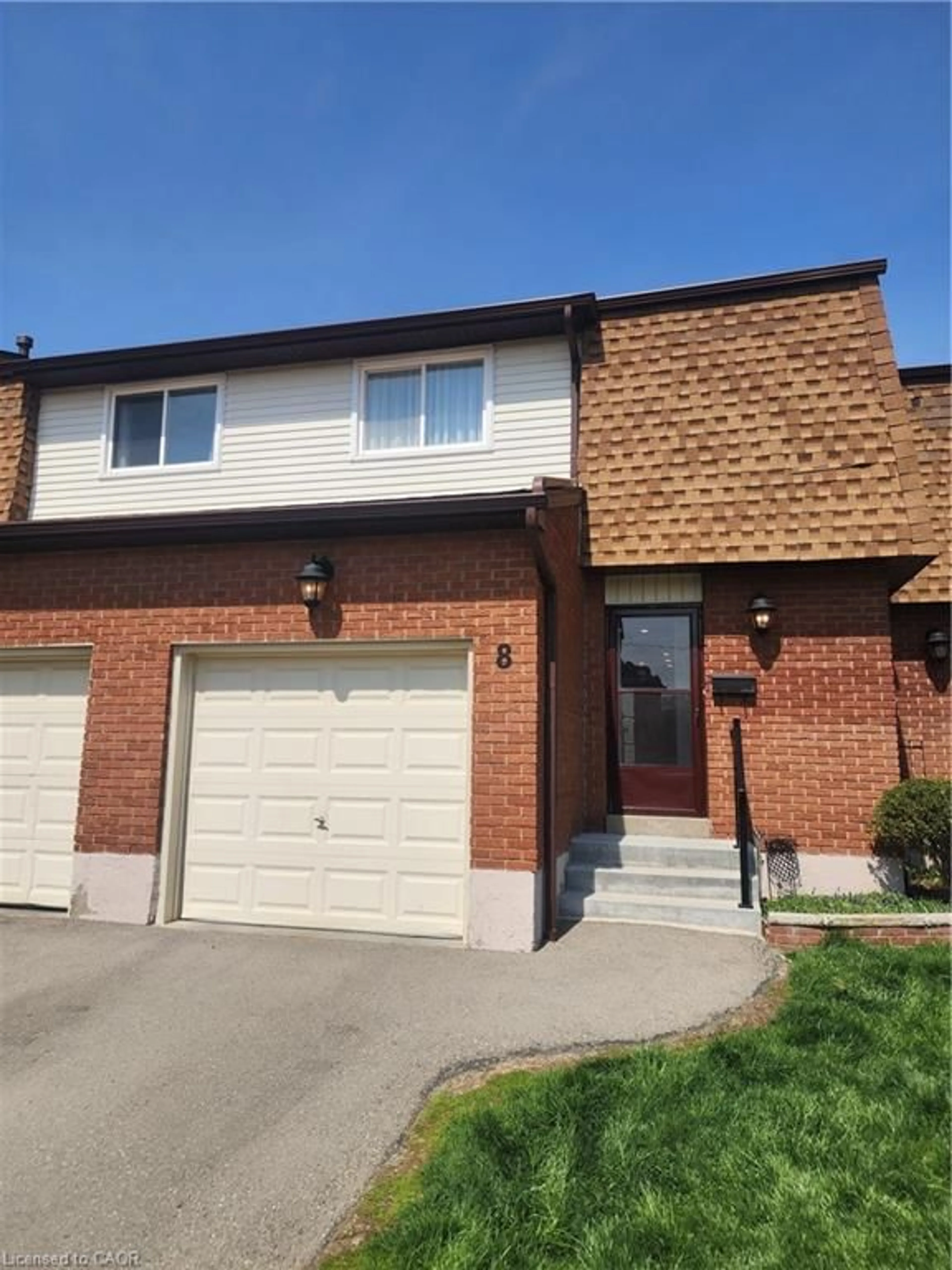 Home with brick exterior material, street for 899 Stone Church Rd #8, Hamilton Ontario L8W 1B2