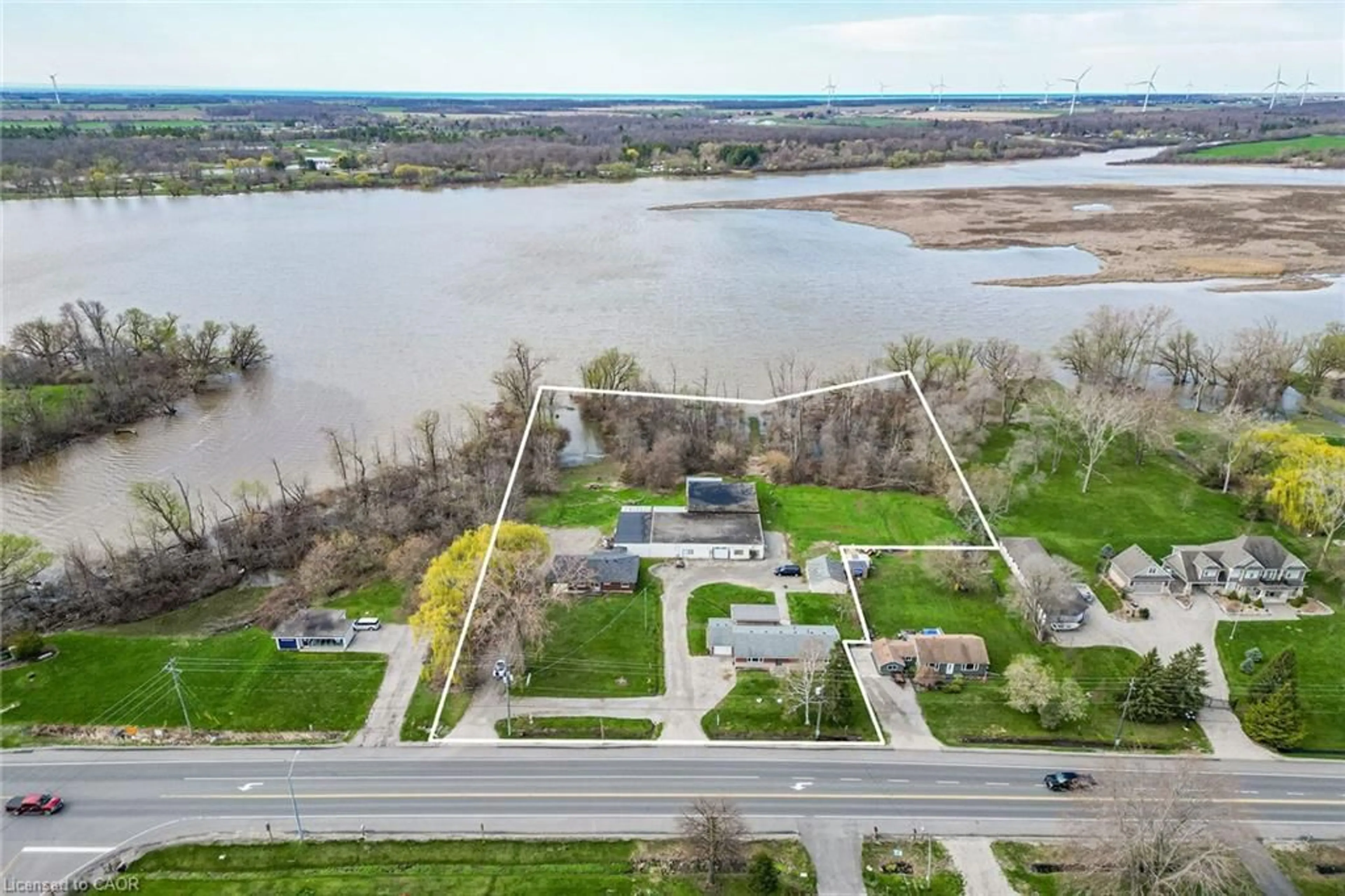 A pic from outside/outdoor area/front of a property/back of a property/a pic from drone, water/lake/river/ocean view for 8410-8408 Highway 3, Dunnville Ontario N1A 2W4