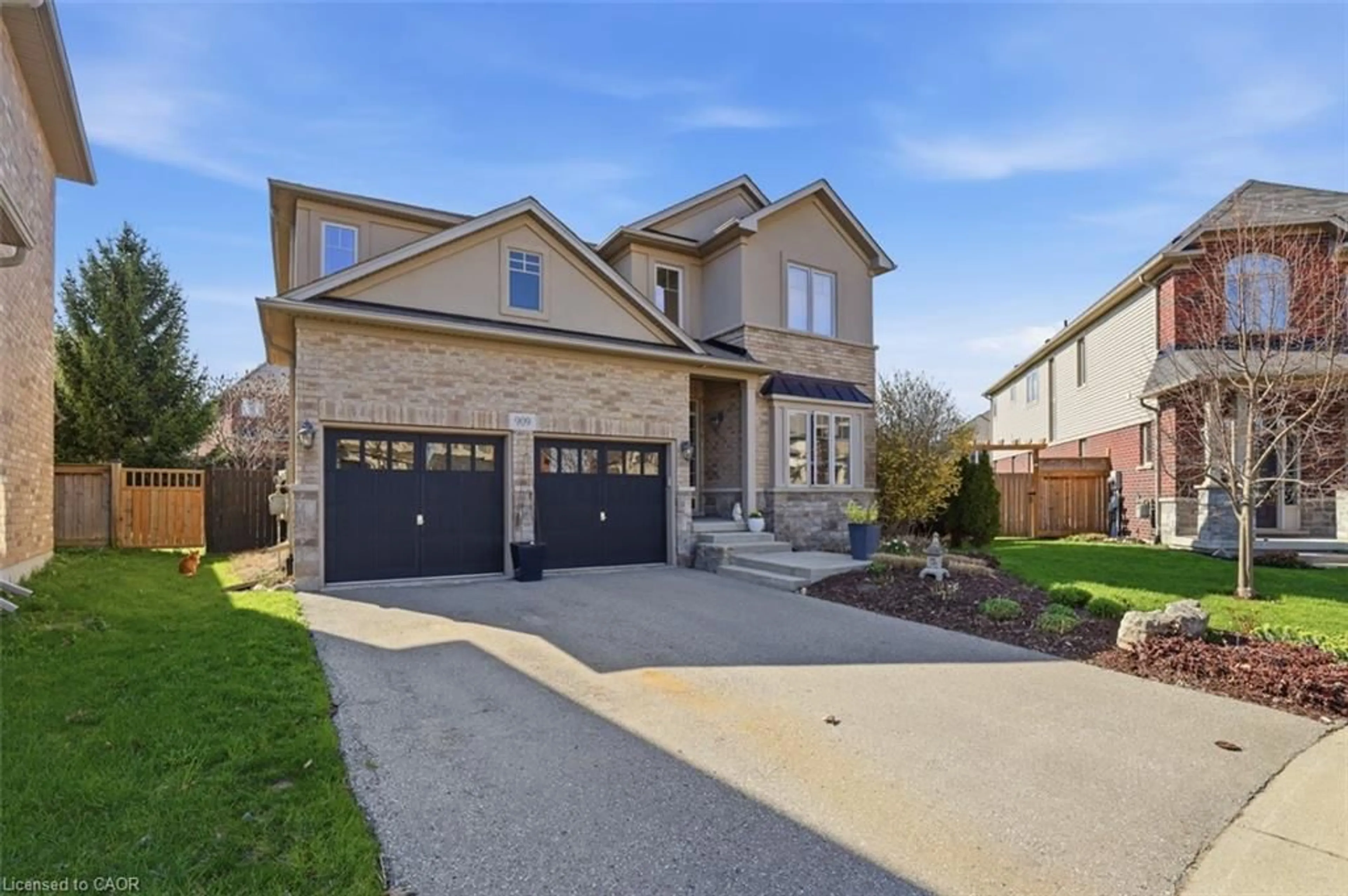 Home with brick exterior material, street for 909 King Rail Crt, Kitchener Ontario N2K 0B1