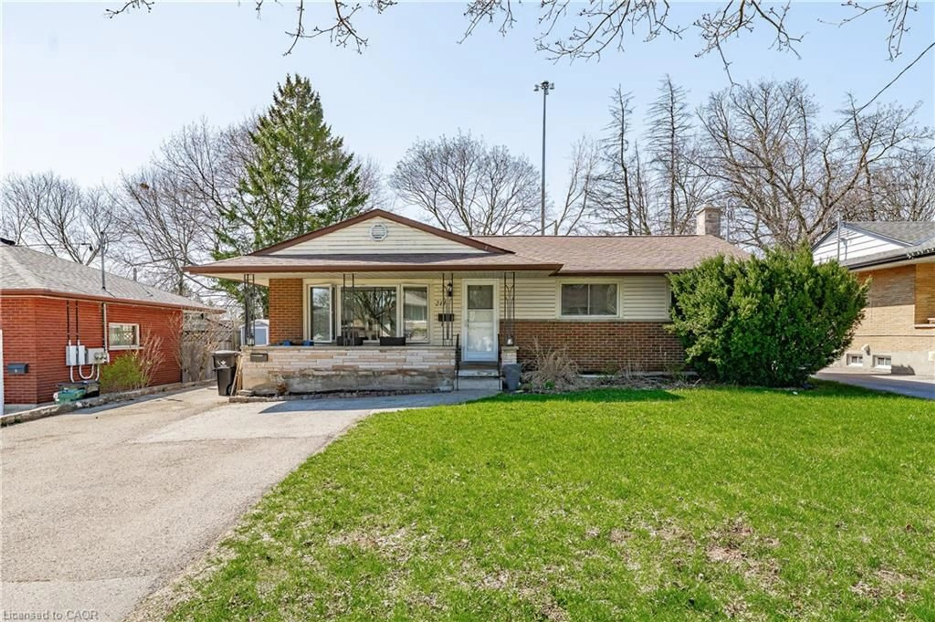 Home with brick exterior material, street for 211 Dixon St, Kitchener Ontario N2G 3E8