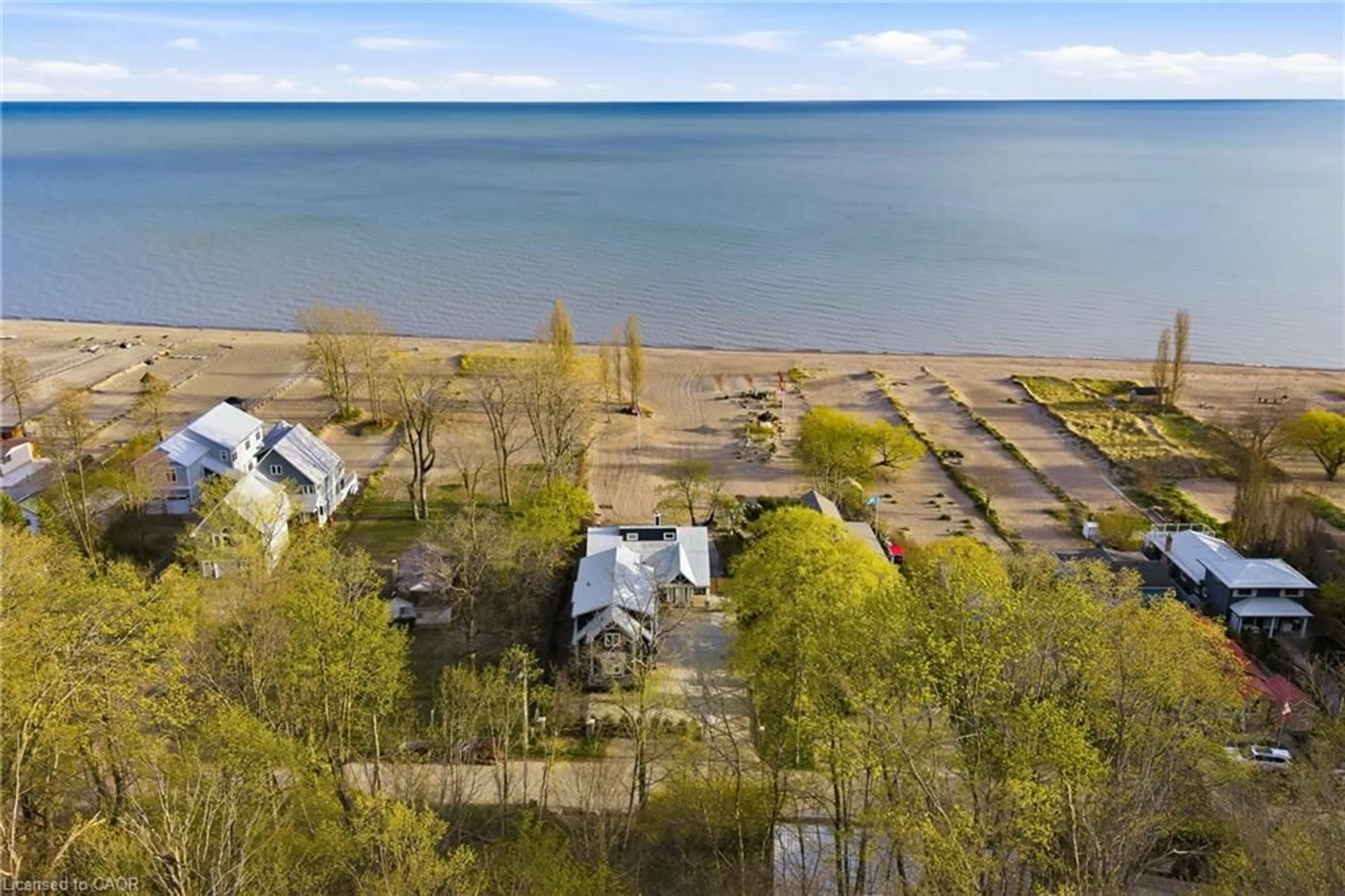 A pic from outside/outdoor area/front of a property/back of a property/a pic from drone, water/lake/river/ocean view for 464 West Edith Cavell Blvd, Port Stanley Ontario N5L 1G9